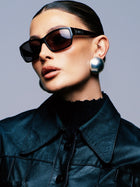 Dolce & Gabbana 2000s rectangle logo sunglasses with black frames and dark tinted lenses, stylish and iconic eyewear.