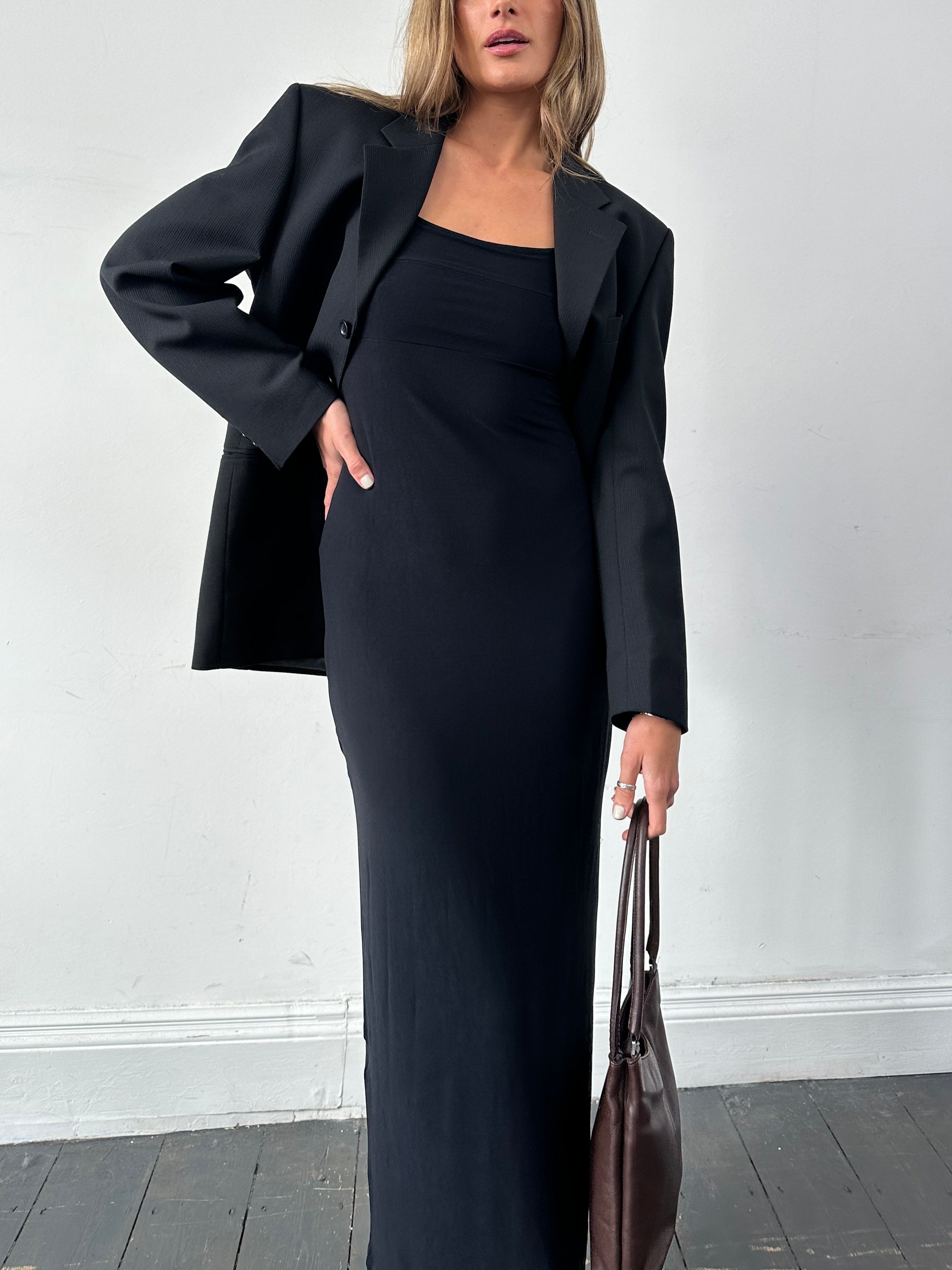 Vintage 90s side split stretch maxi dress in S/M, featuring a flowing fabric, elegant design, and retro style.