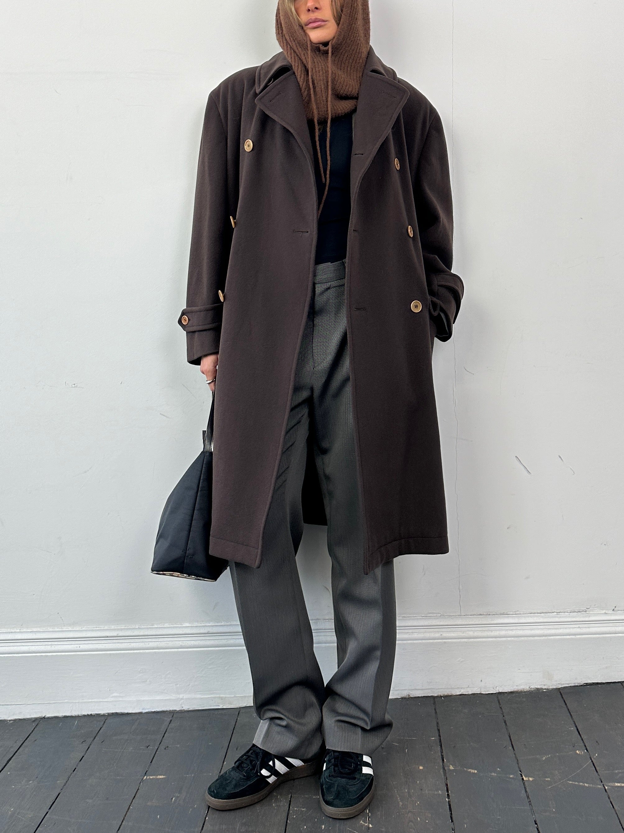 Valentino pure wool double-breasted coat in size XL, featuring a classic tailored design with lapels and front buttons.