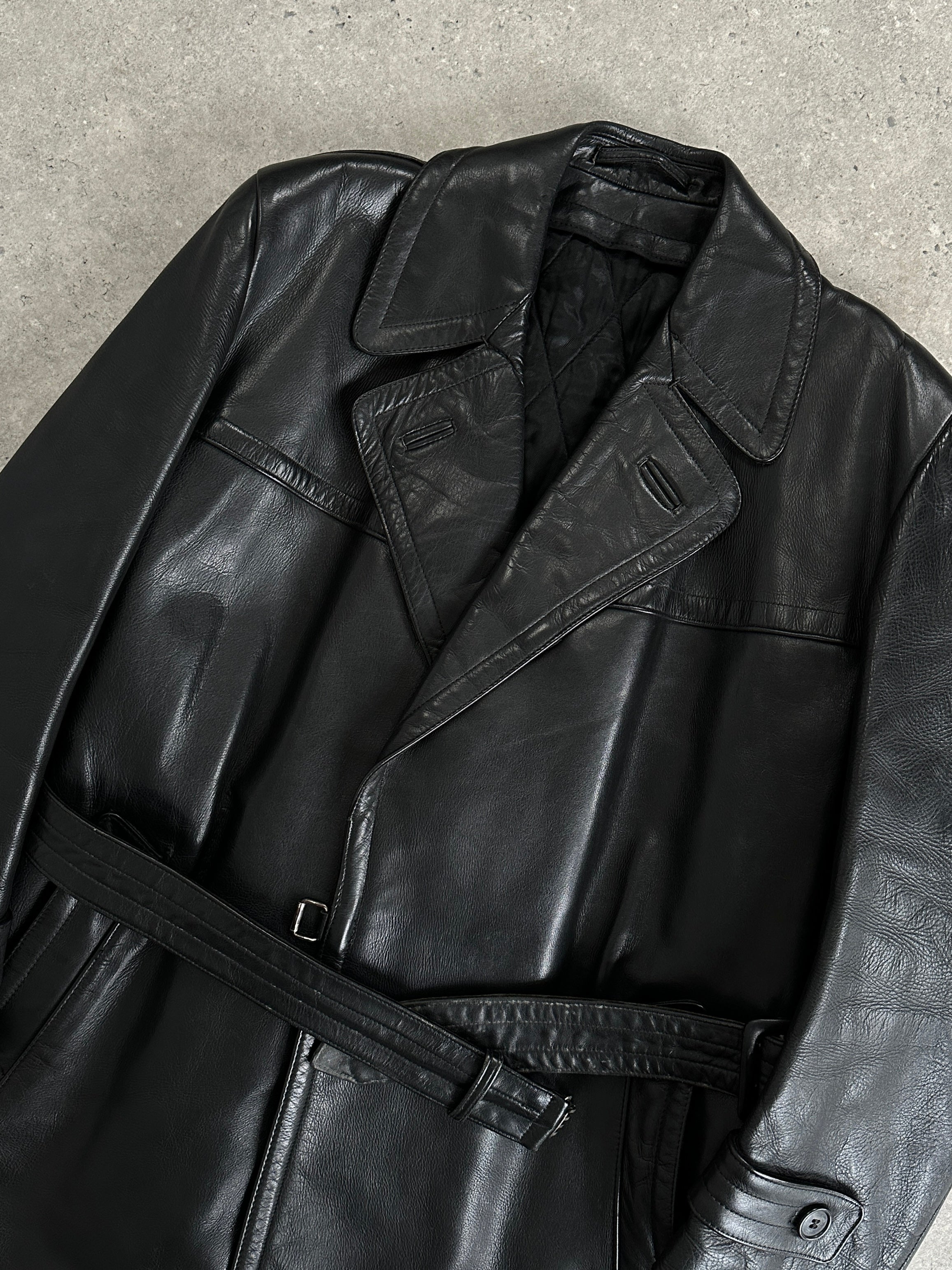 Vintage leather belted trench coat jacket in size large, featuring classic design and stylish details.