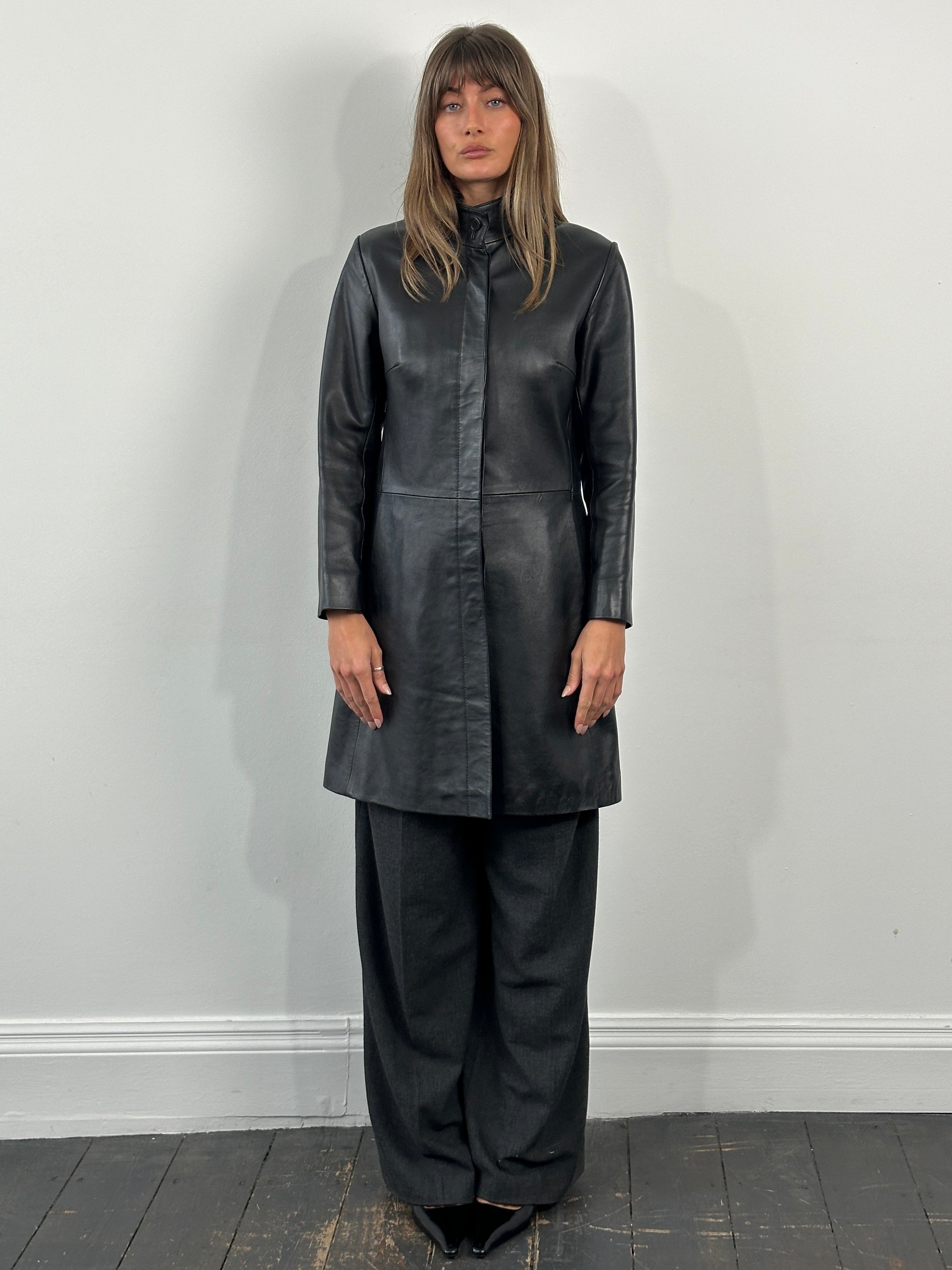 Vintage 1990s minimal high neck leather trench coat in size S, stylish and sleek design with classic leather finish.