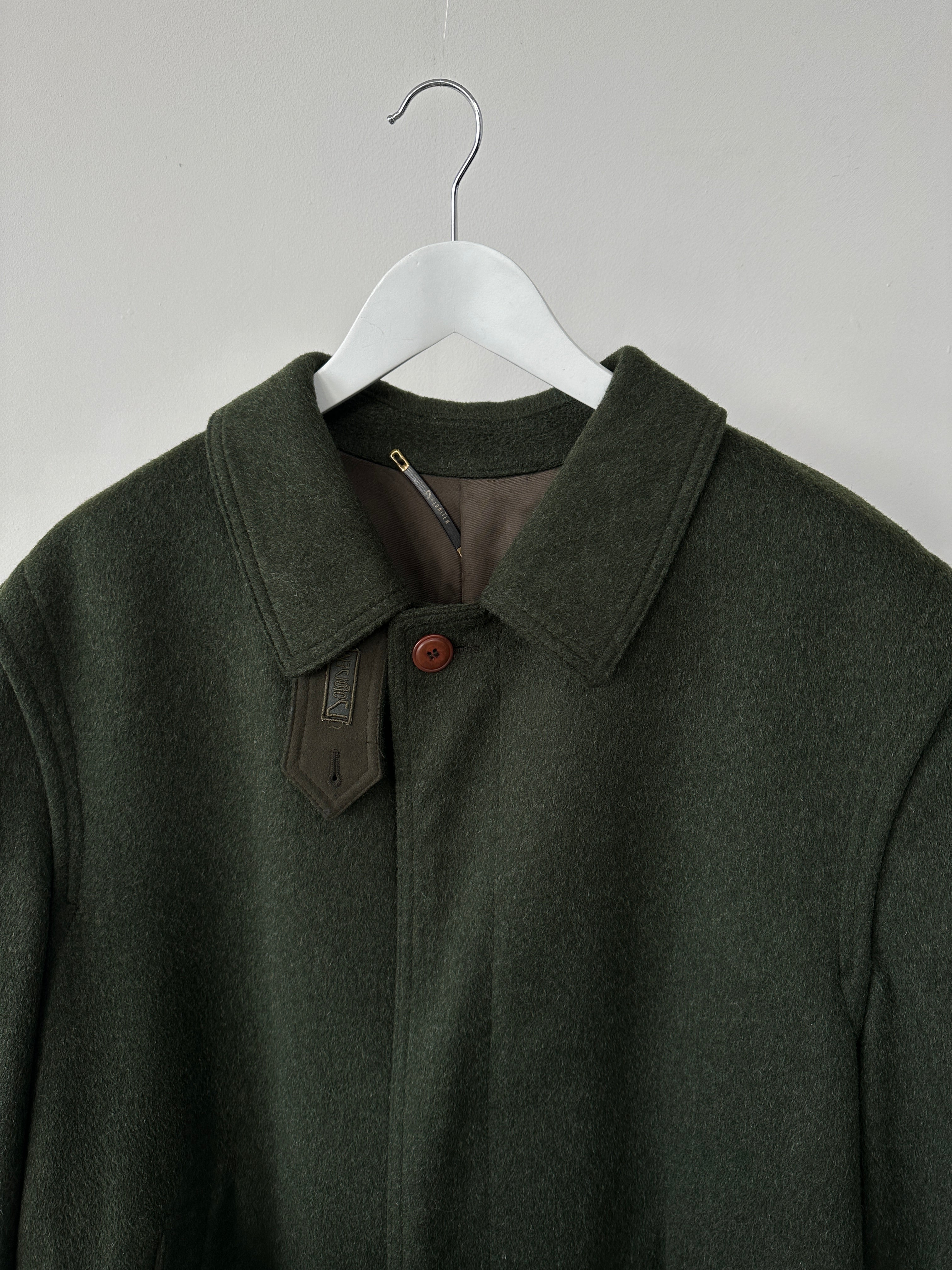 Vintage wool coat with concealed placket, single-breasted design in size XL, featuring classic tailored style and textured fabric.