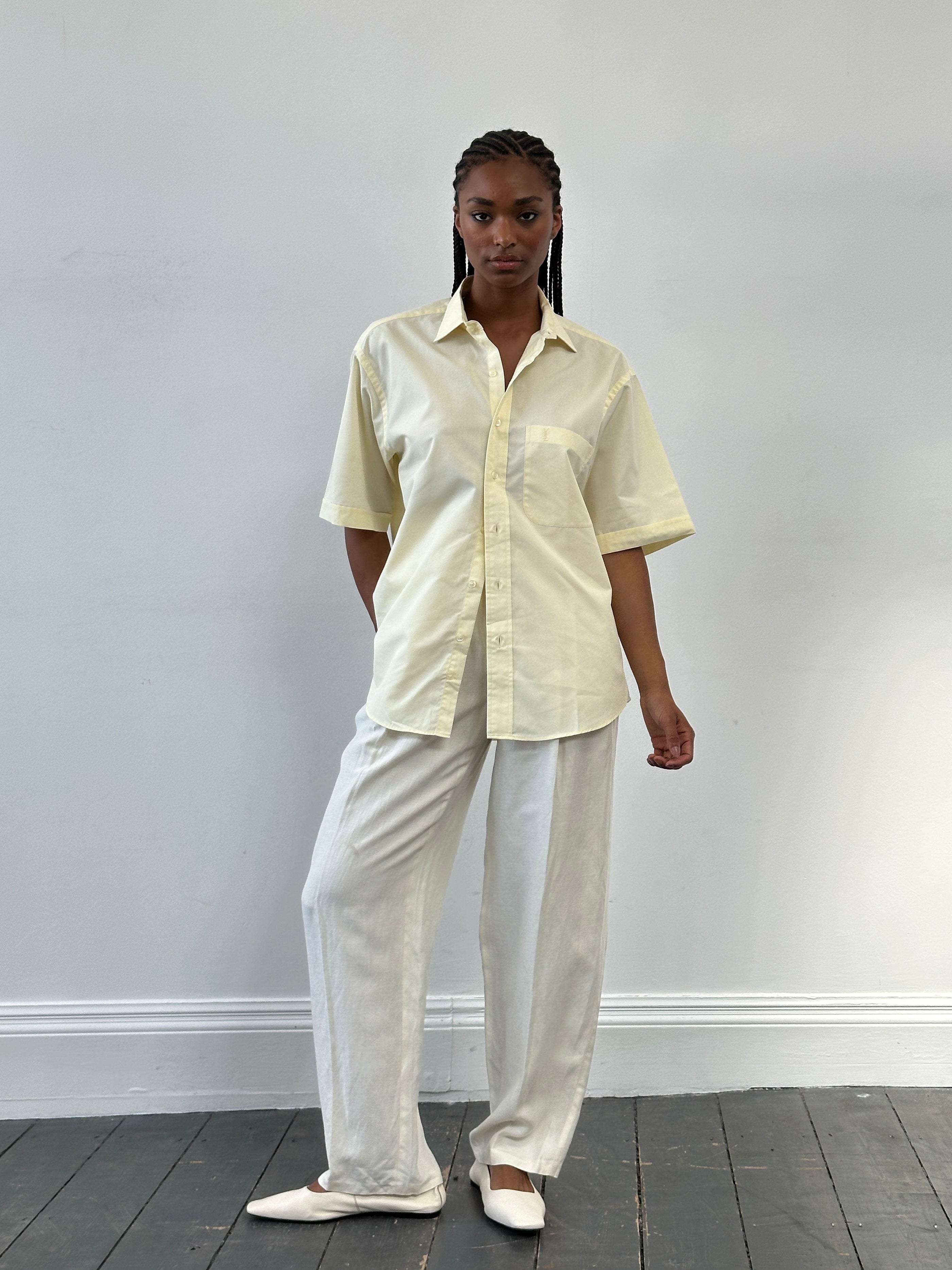 Yves Saint Laurent Pour Homme 1990s cotton short sleeve logo shirt in size L, white with YSL branding on the chest.