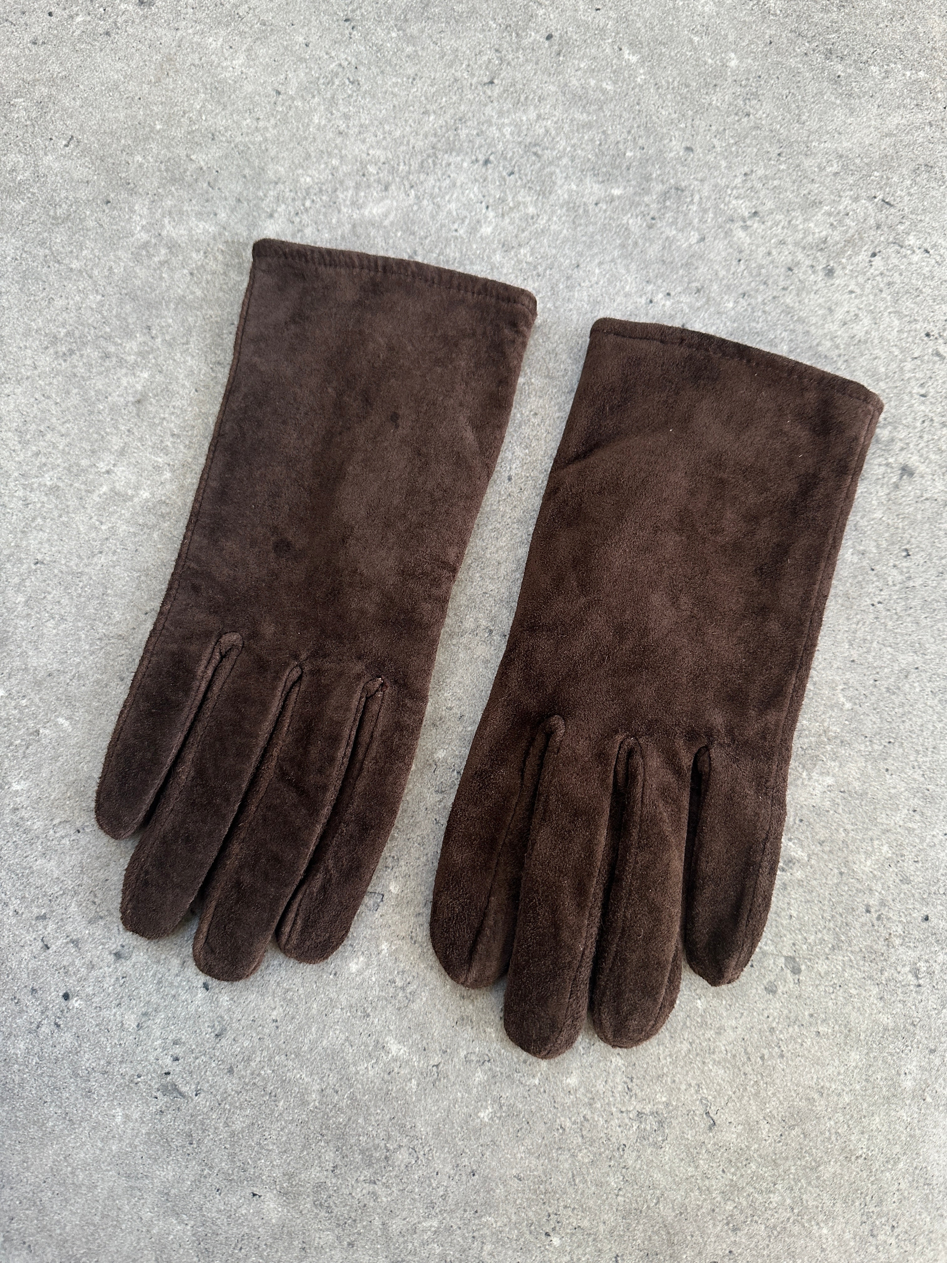 Vintage suede gloves, size small, featuring soft textured material and classic design, perfect for stylish cold weather wear.