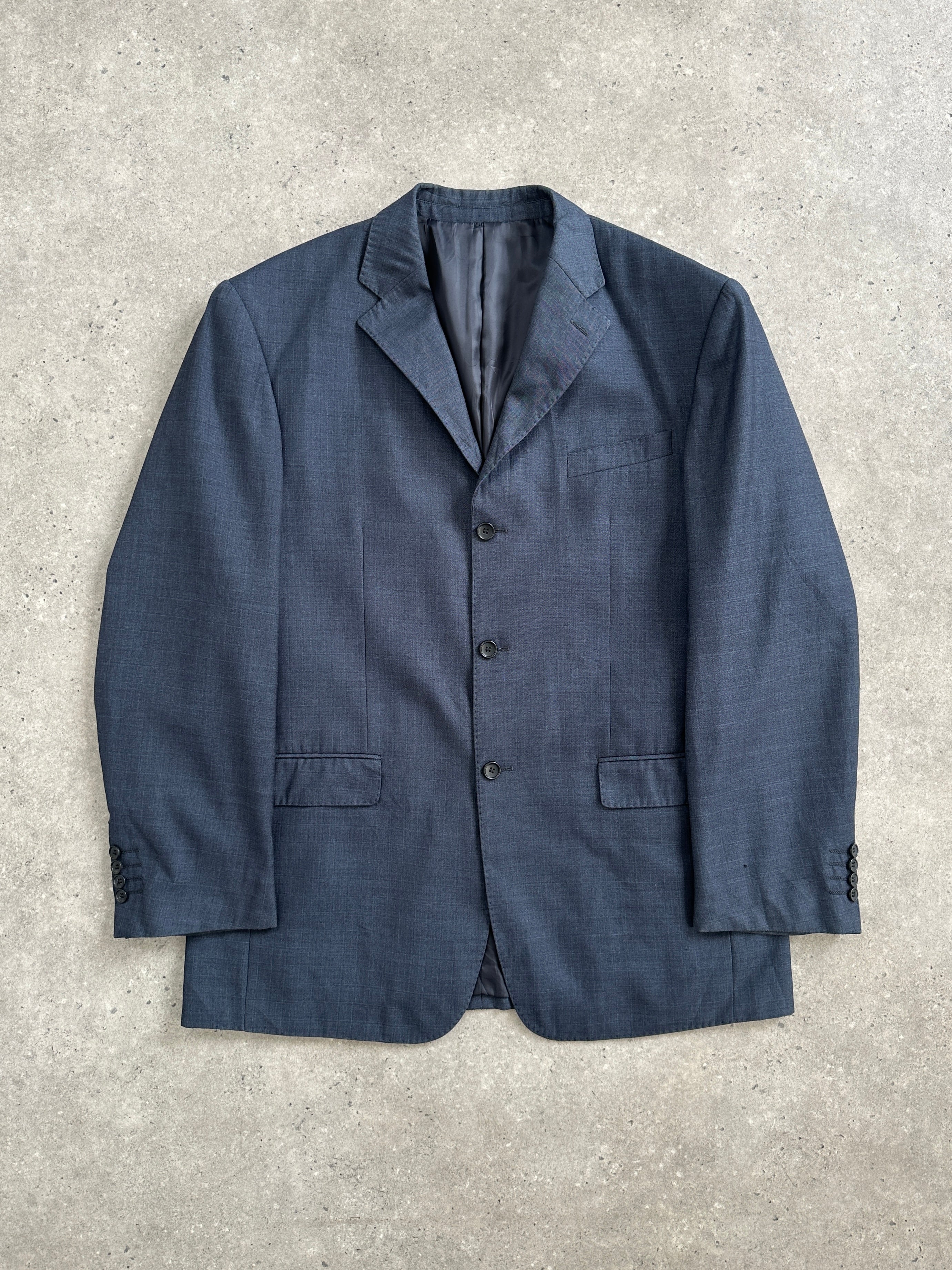 Vintage 1990s wool single-breasted blazer in size 48R/XXXL, classic tailored style with notch lapels and button closure.