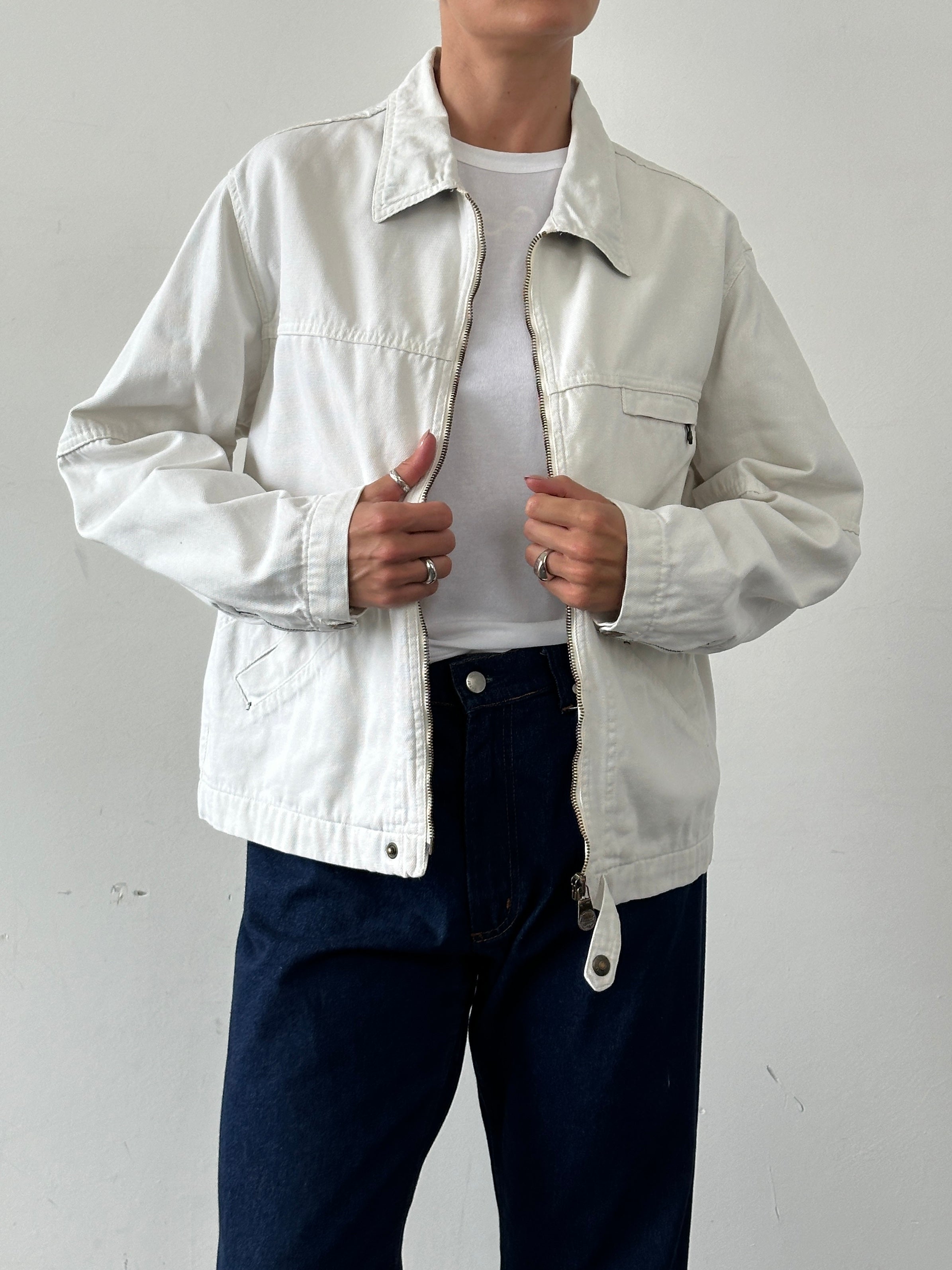 Levi’s cotton zip-up bomber jacket in size L, featuring a classic design with a front zipper and ribbed cuffs.