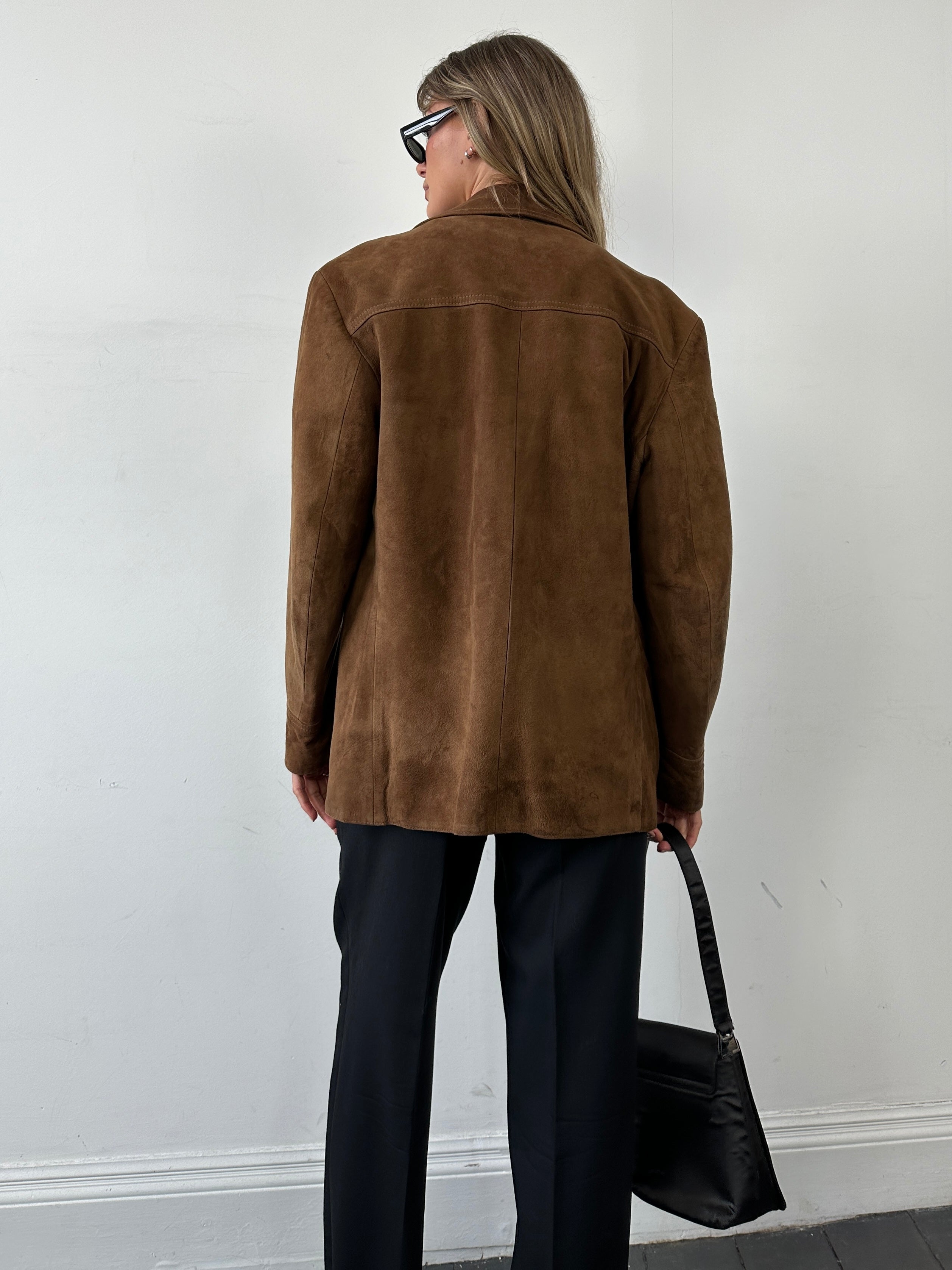 British vintage 70s suede leather trucker jacket in size large, featuring classic design and authentic distressed finish.