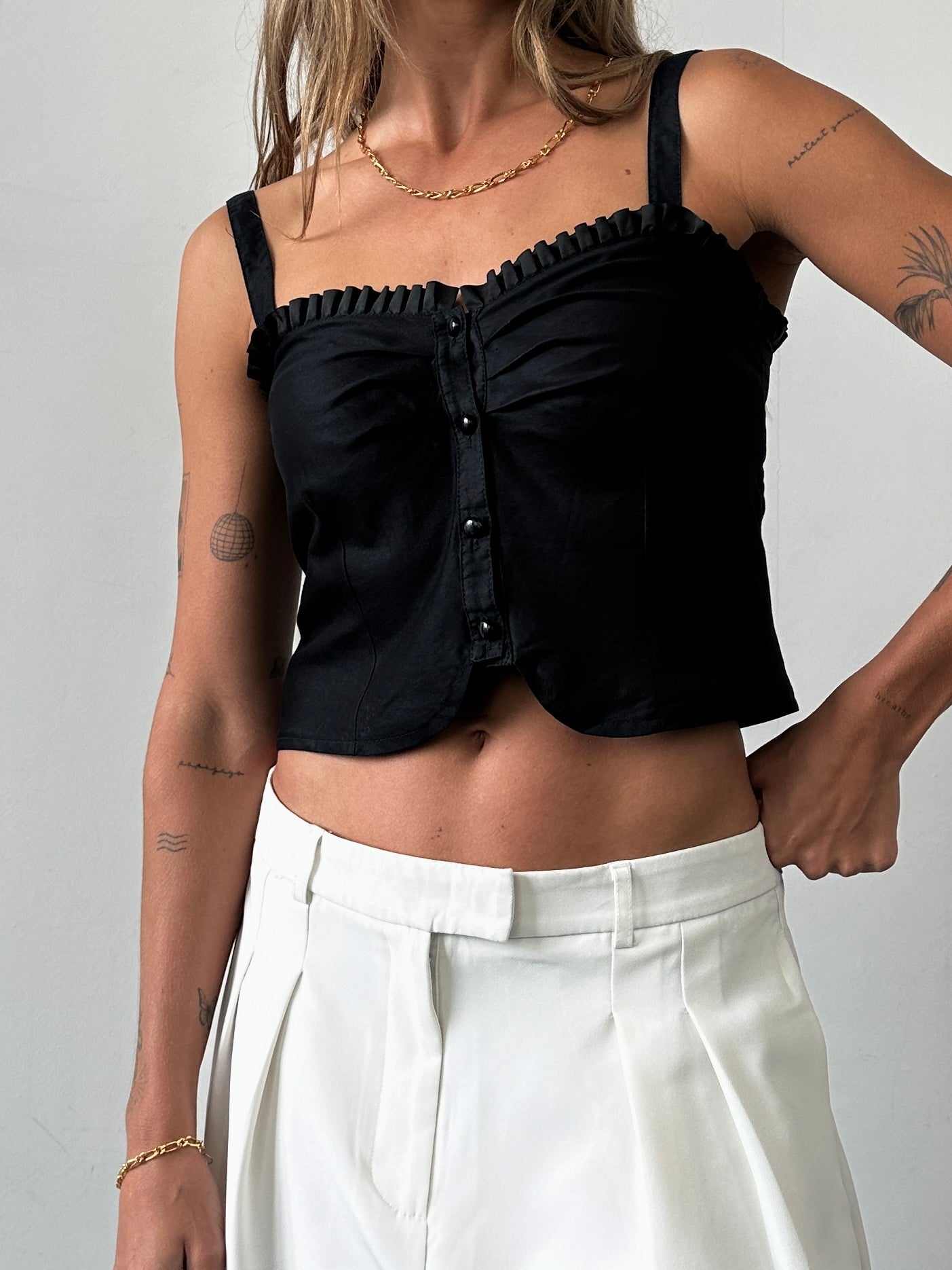 Vintage frill trim crop top in size S, featuring a stylish design with delicate frills and a fitted silhouette.