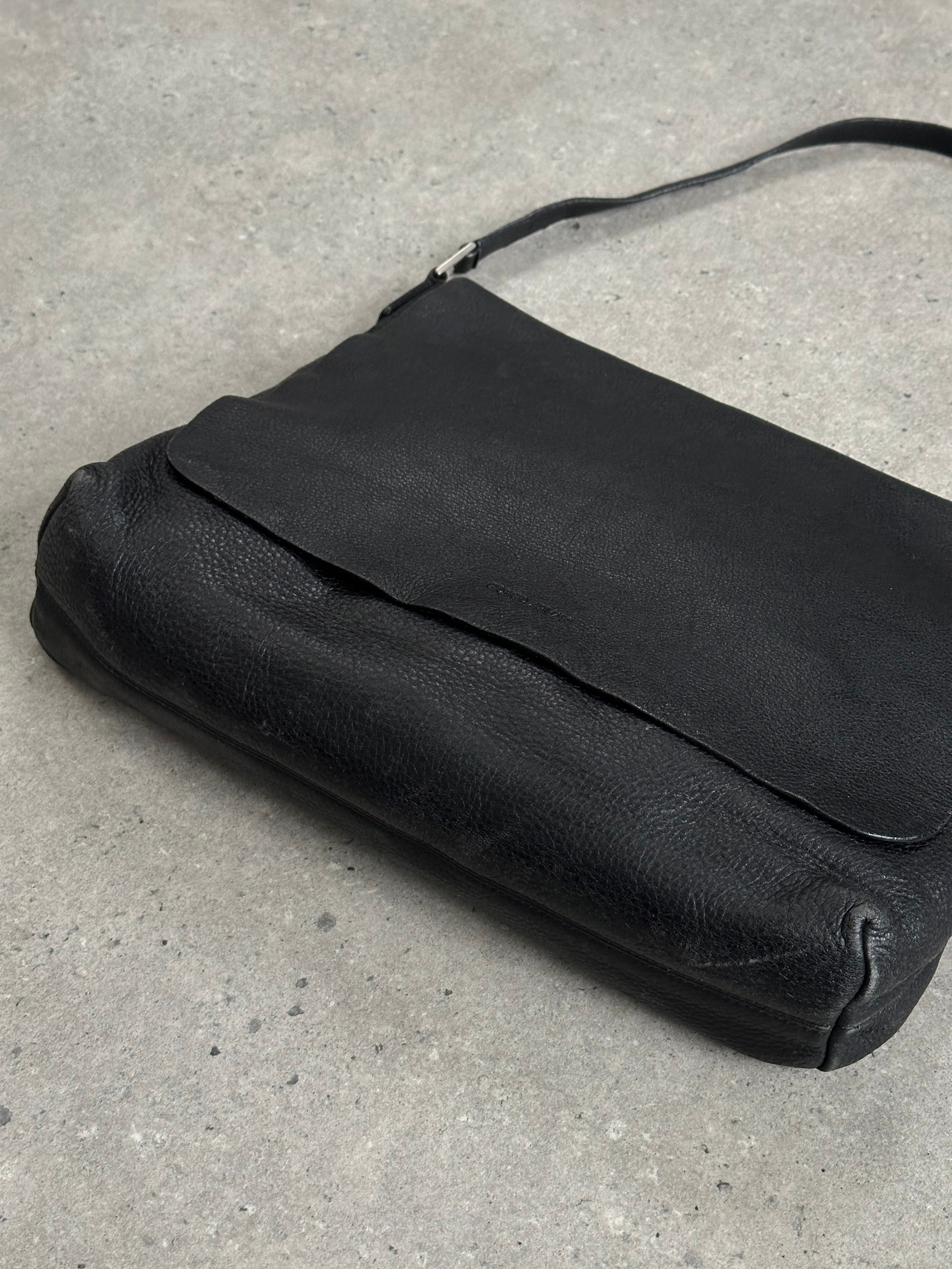 Giorgio Armani 2000s leather crossbody bag in classic design with adjustable strap and subtle branding details.