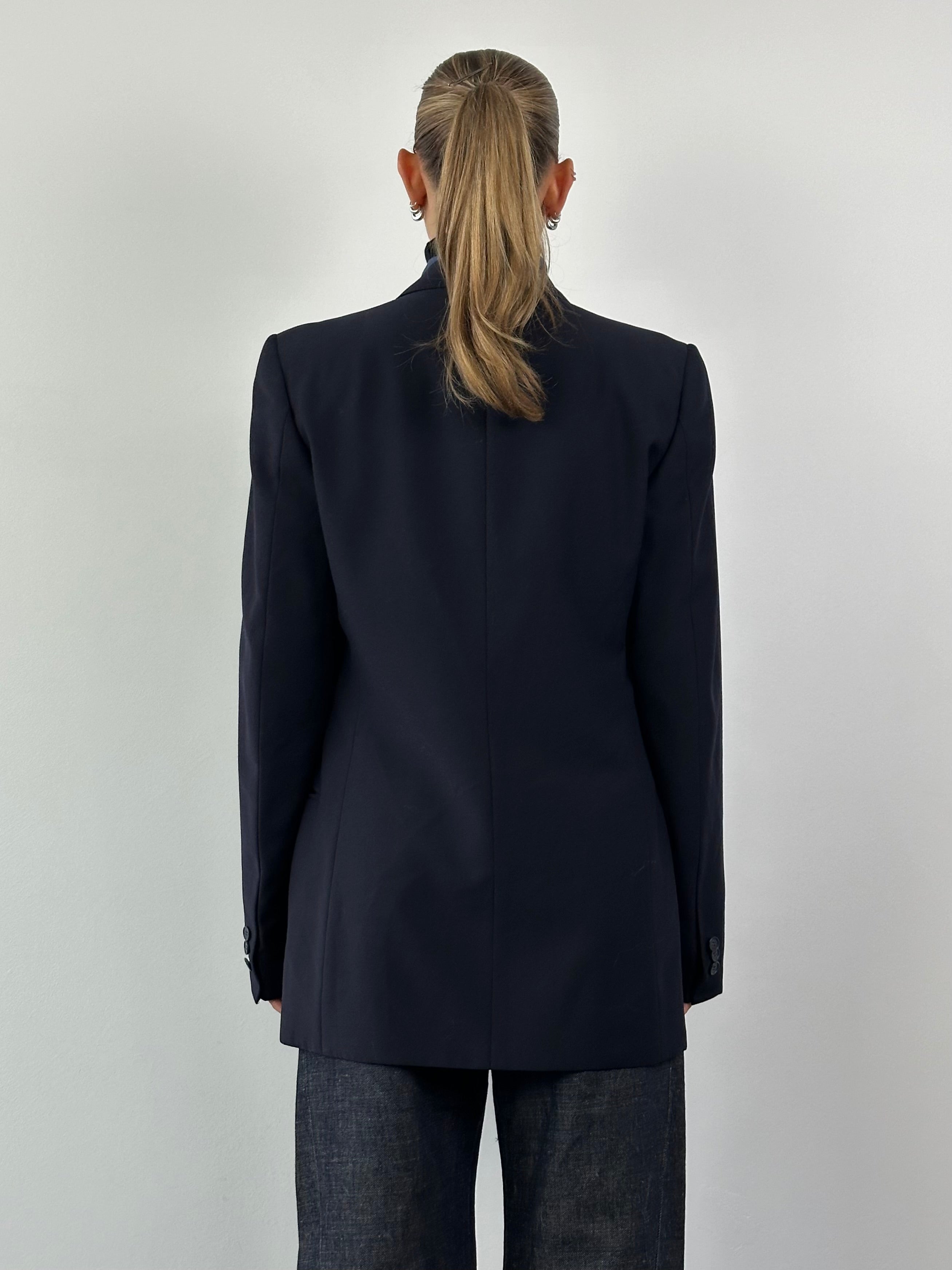 Vintage pure virgin wool double-breasted blazer in size L/XL, tailored fit with classic lapels and button details.
