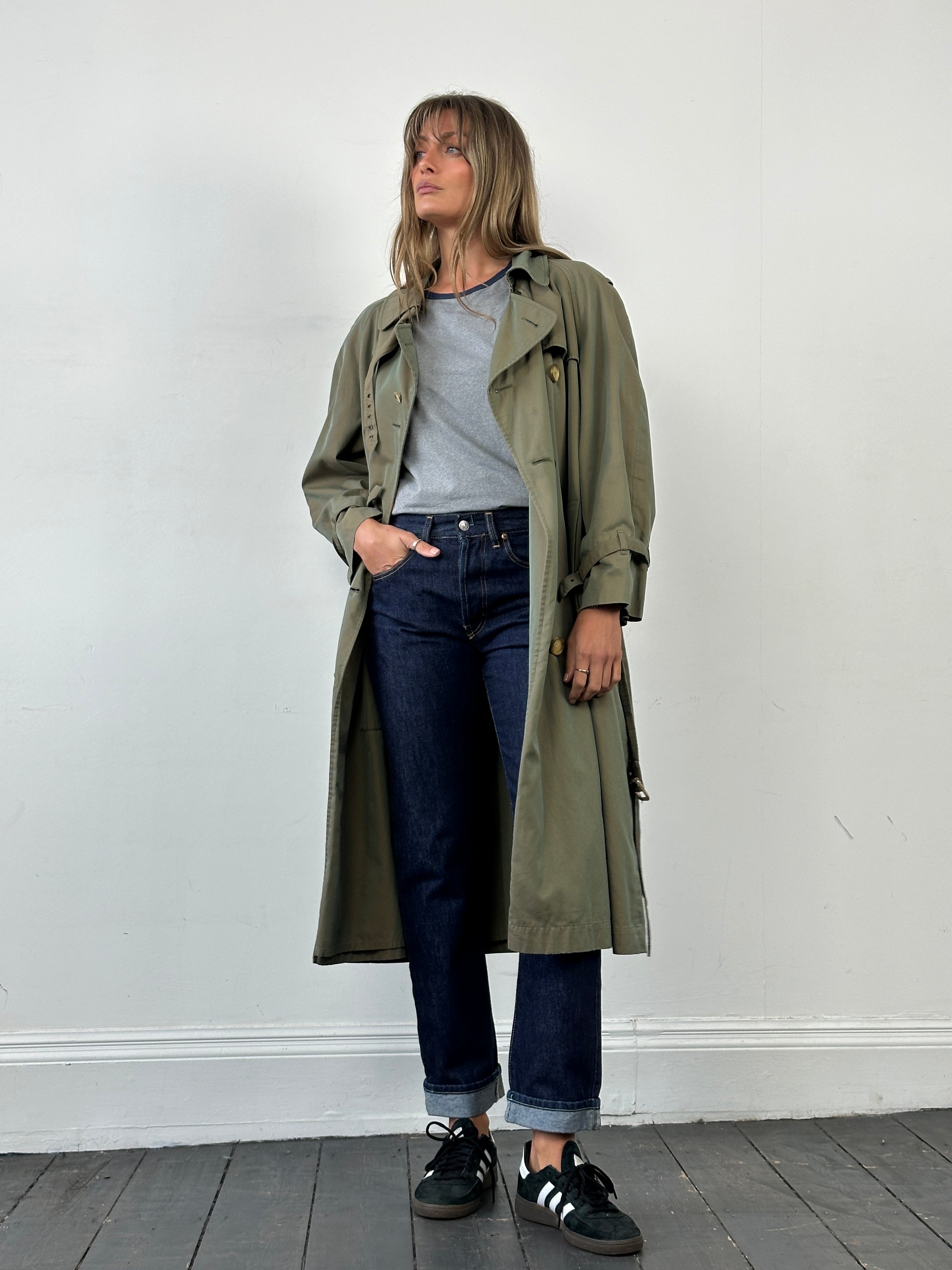 Yves Saint Laurent 1980s Rive Gauche double-breasted trench coat in beige, tailored with wide lapels and belted waist, size L.