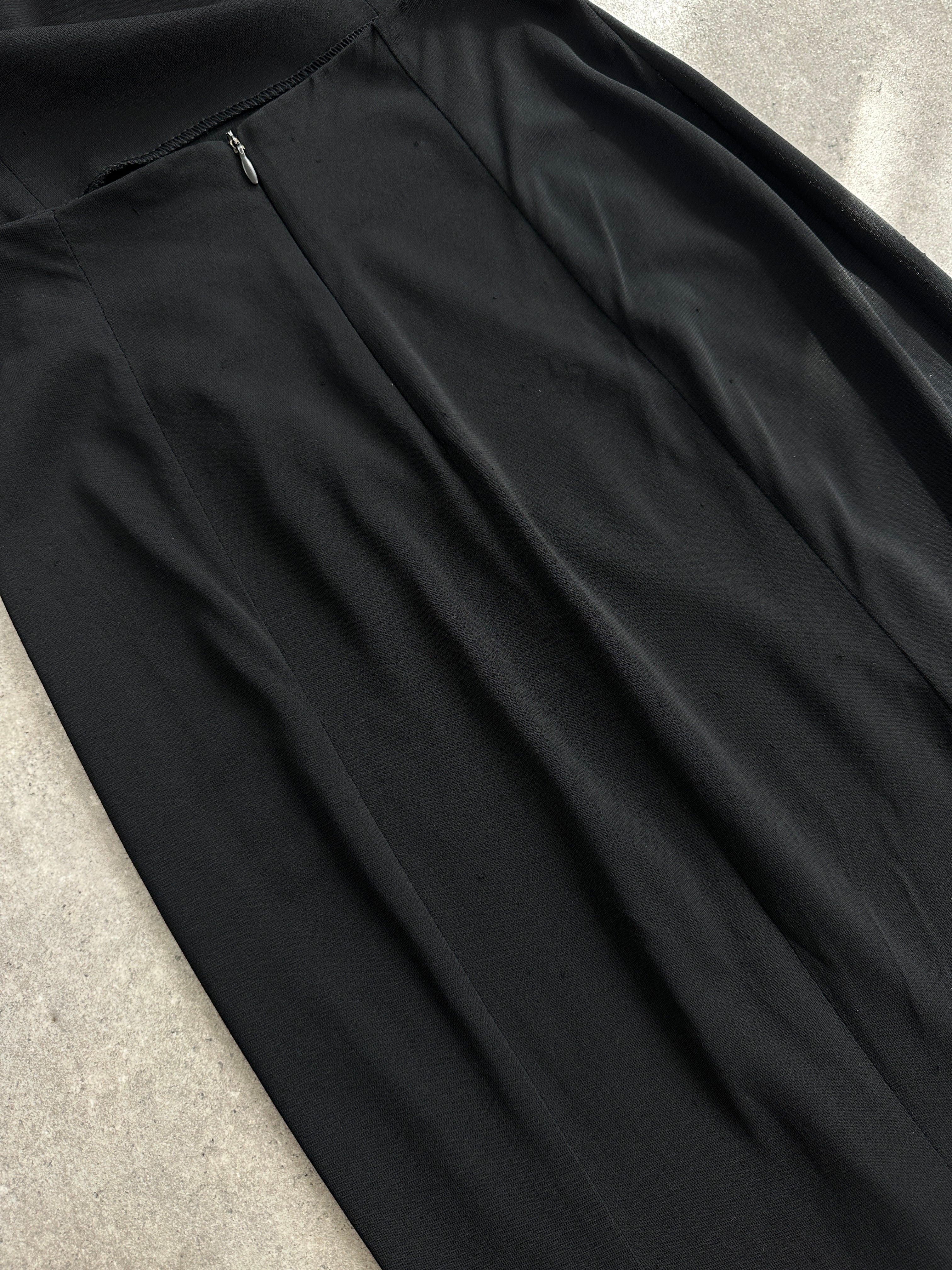 Vintage Italian vintage cut-out maxi dress in size small, featuring flowing fabric and stylish design details.