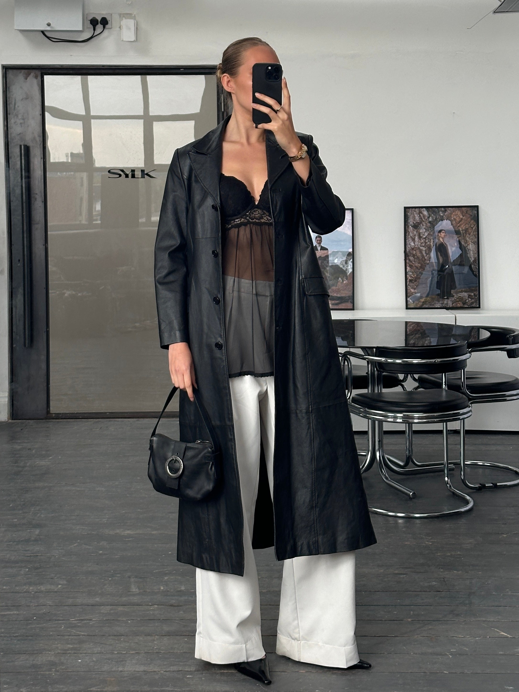 Vintage 1990s floor-length leather trench coat, S/M, showcasing classic leather jacket style and vintage craftsmanship.