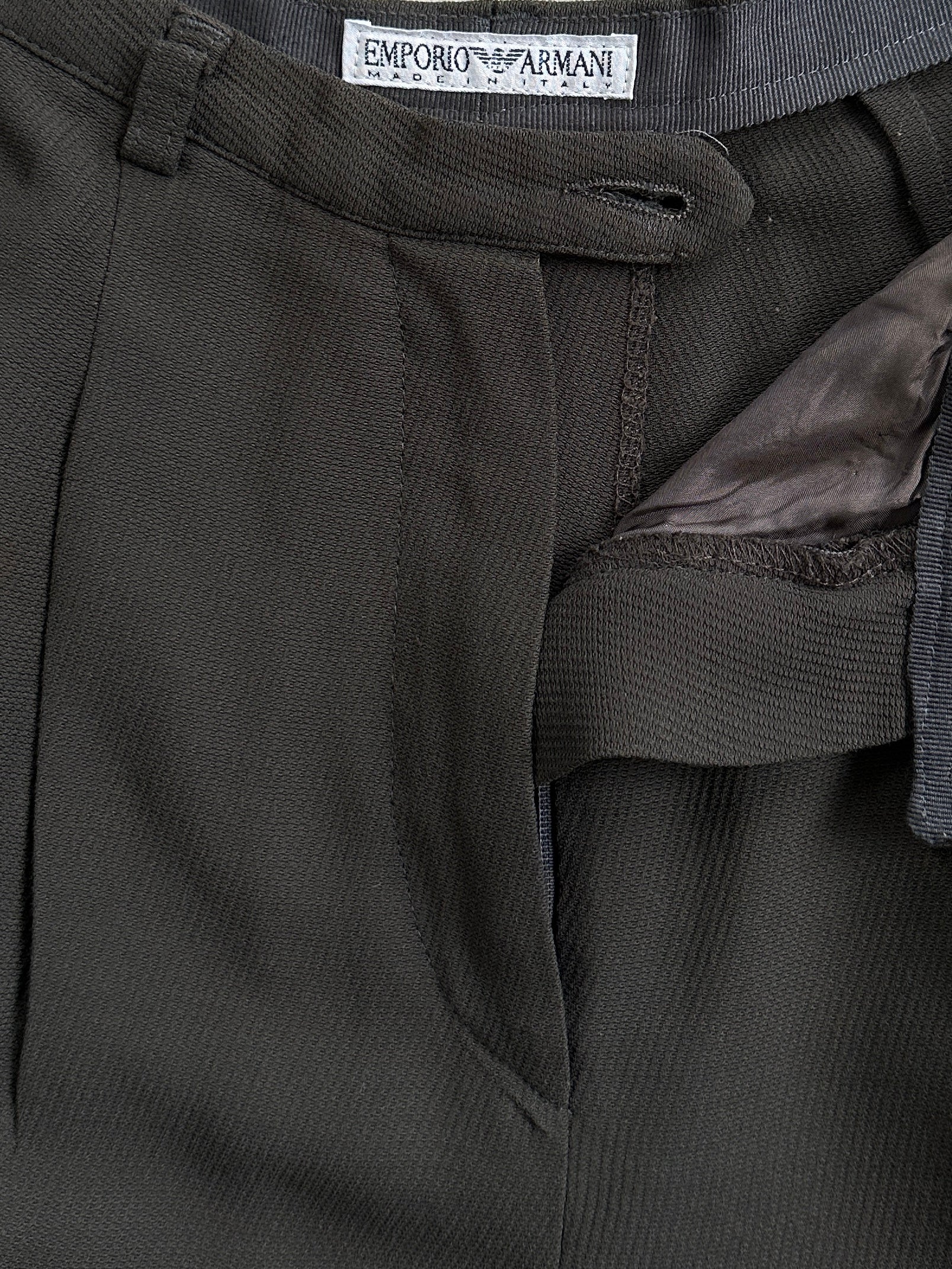 Emporio Armani high waisted tapered leg tailored trousers in classic fabric, front view showing fit and style.
