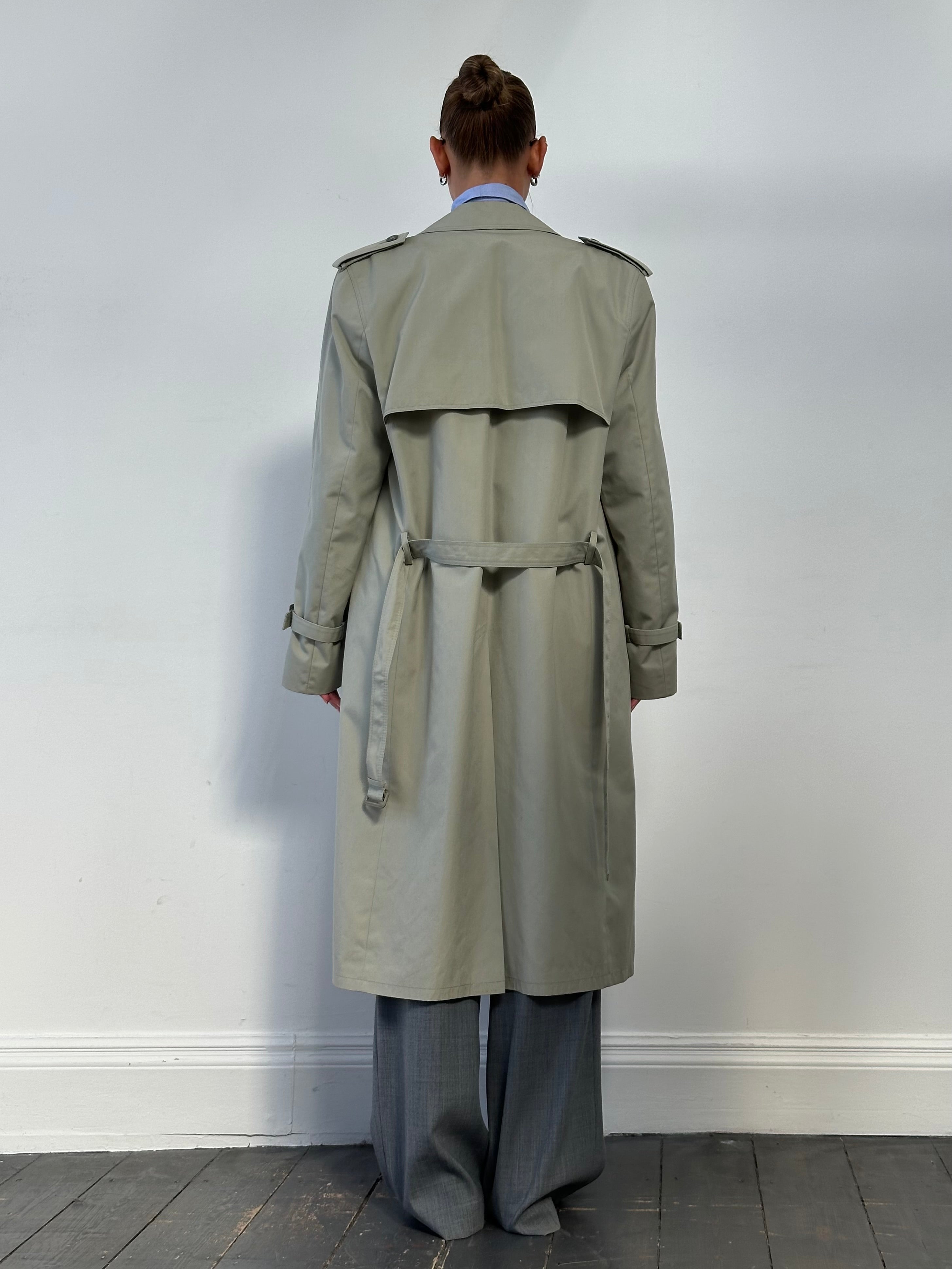 Vintage double-breasted belted trench coat in XL with classic design, featuring a structured silhouette and traditional collar.