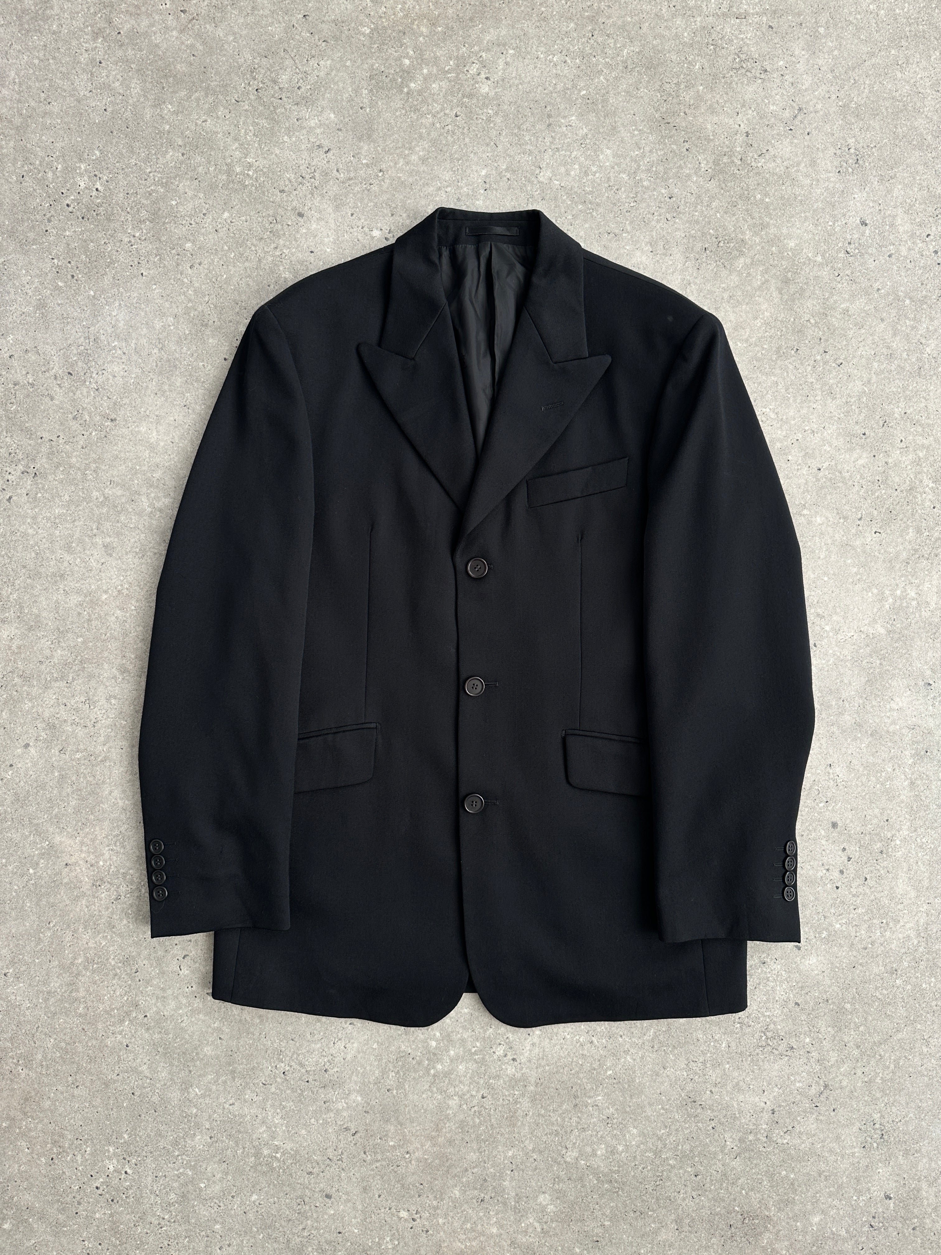 Yves Saint Laurent Pour Homme 1990s pure wool single-breasted blazer, size 36R, in classic navy with notch lapel and button closure.