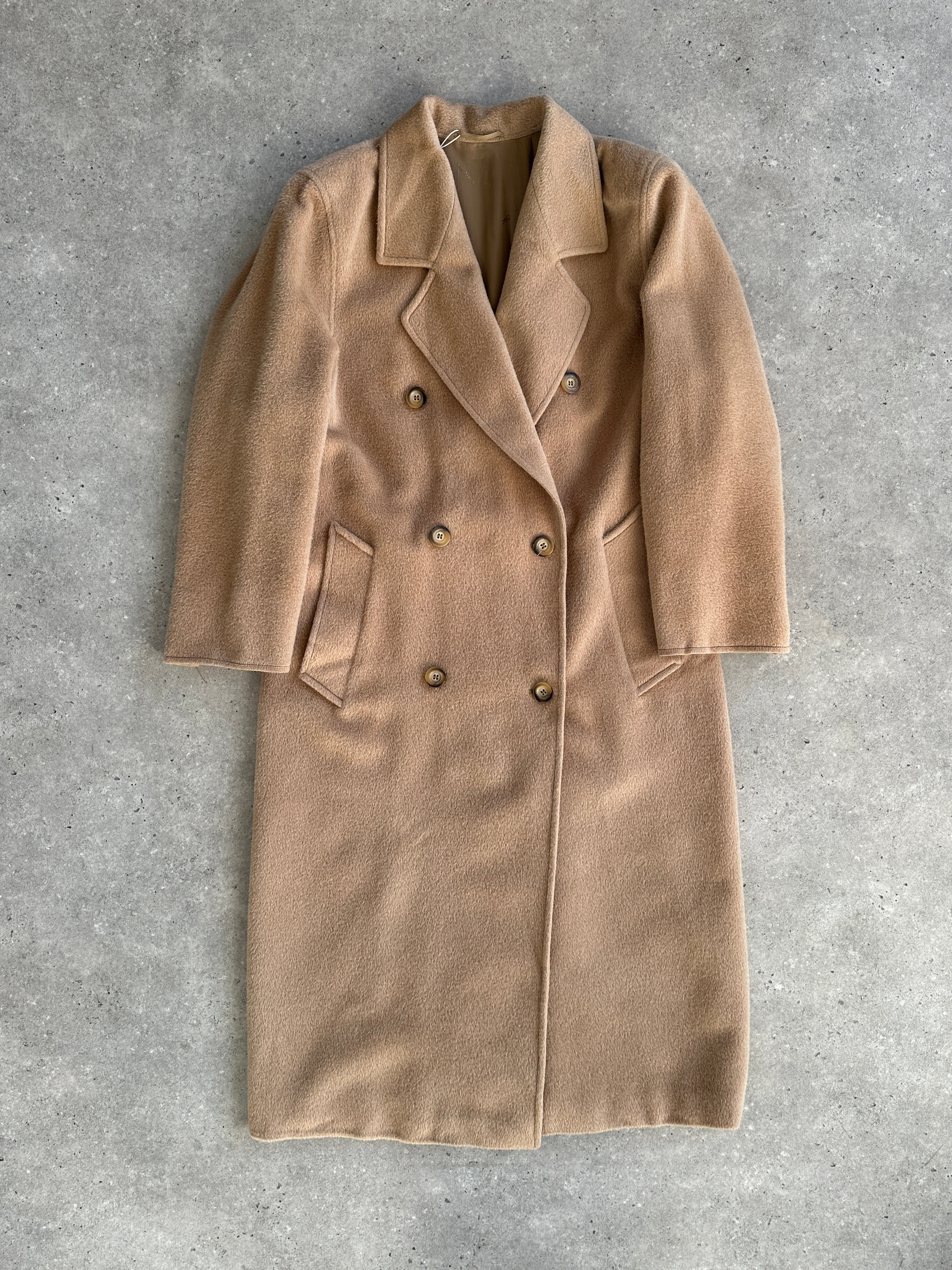 Max Mara wool camel hair double-breasted coat in M/L size, tailored fit, shown on a hanger with detailed lapels and classic design