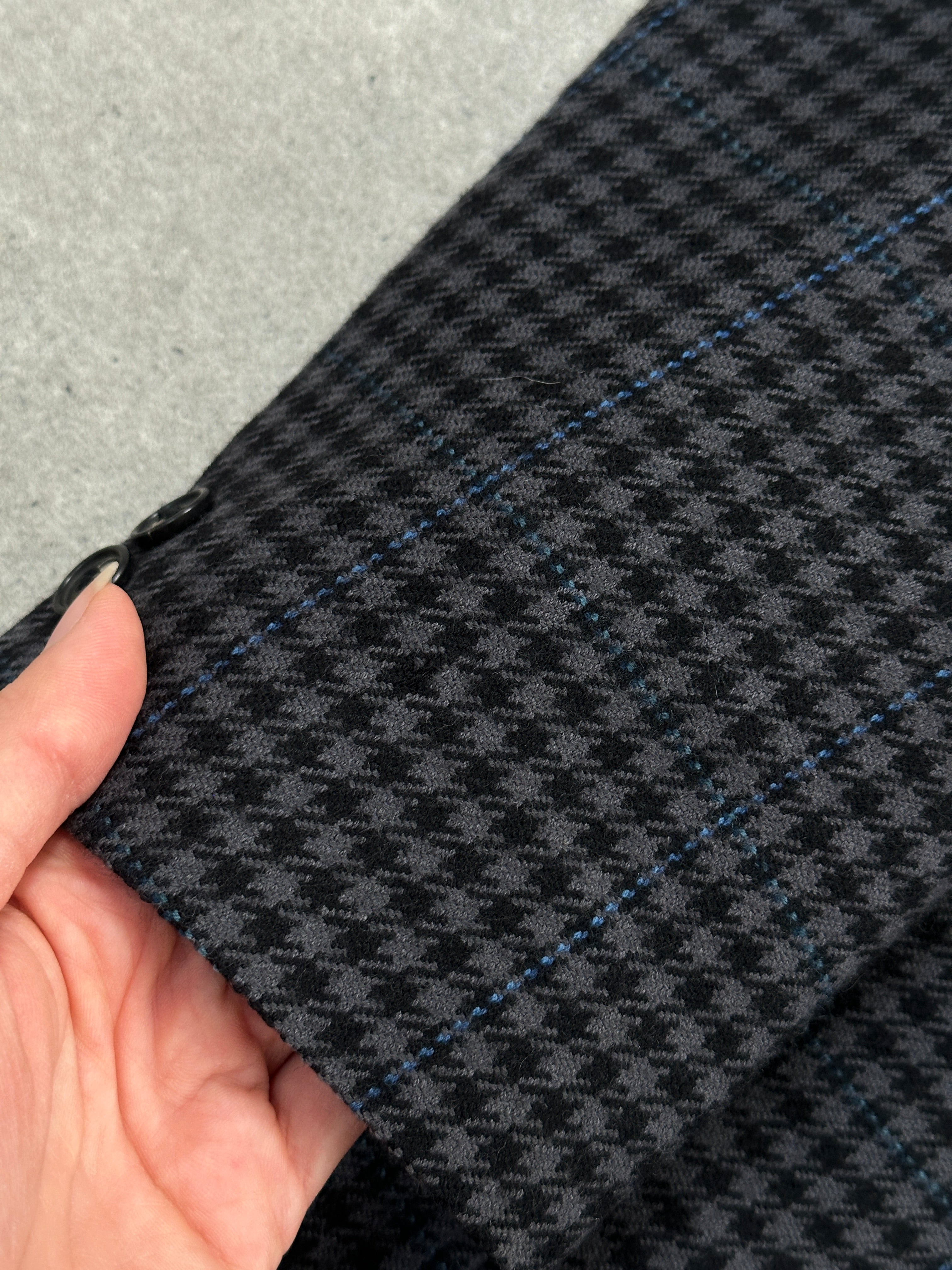 Yves Saint Laurent 1980s check brushed wool blazer in size 40R, featuring classic tailored fit and vintage plaid pattern.
