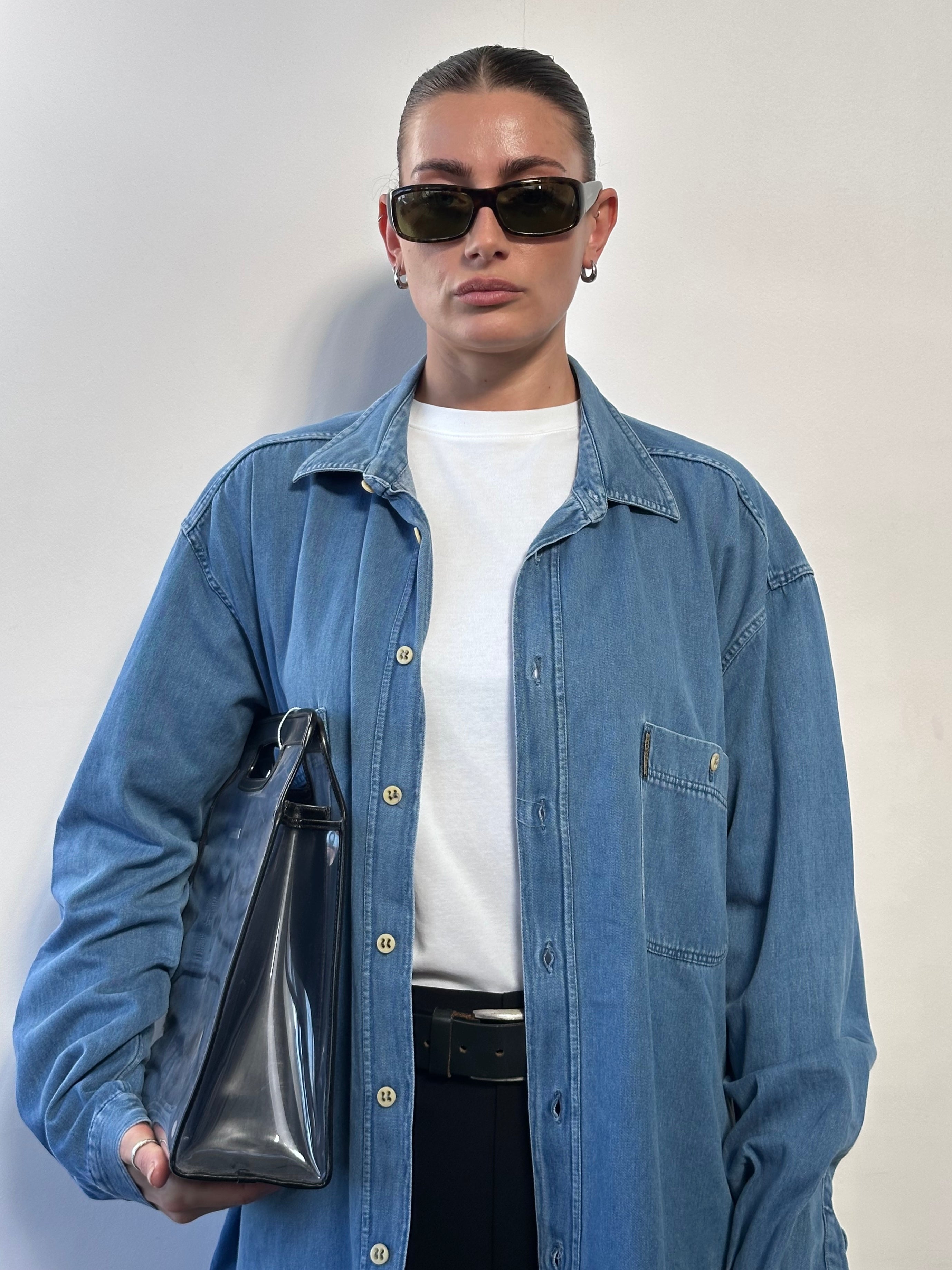 Armani Jeans pure cotton denim shirt in XL size, featuring classic button-down design and blue denim fabric.
