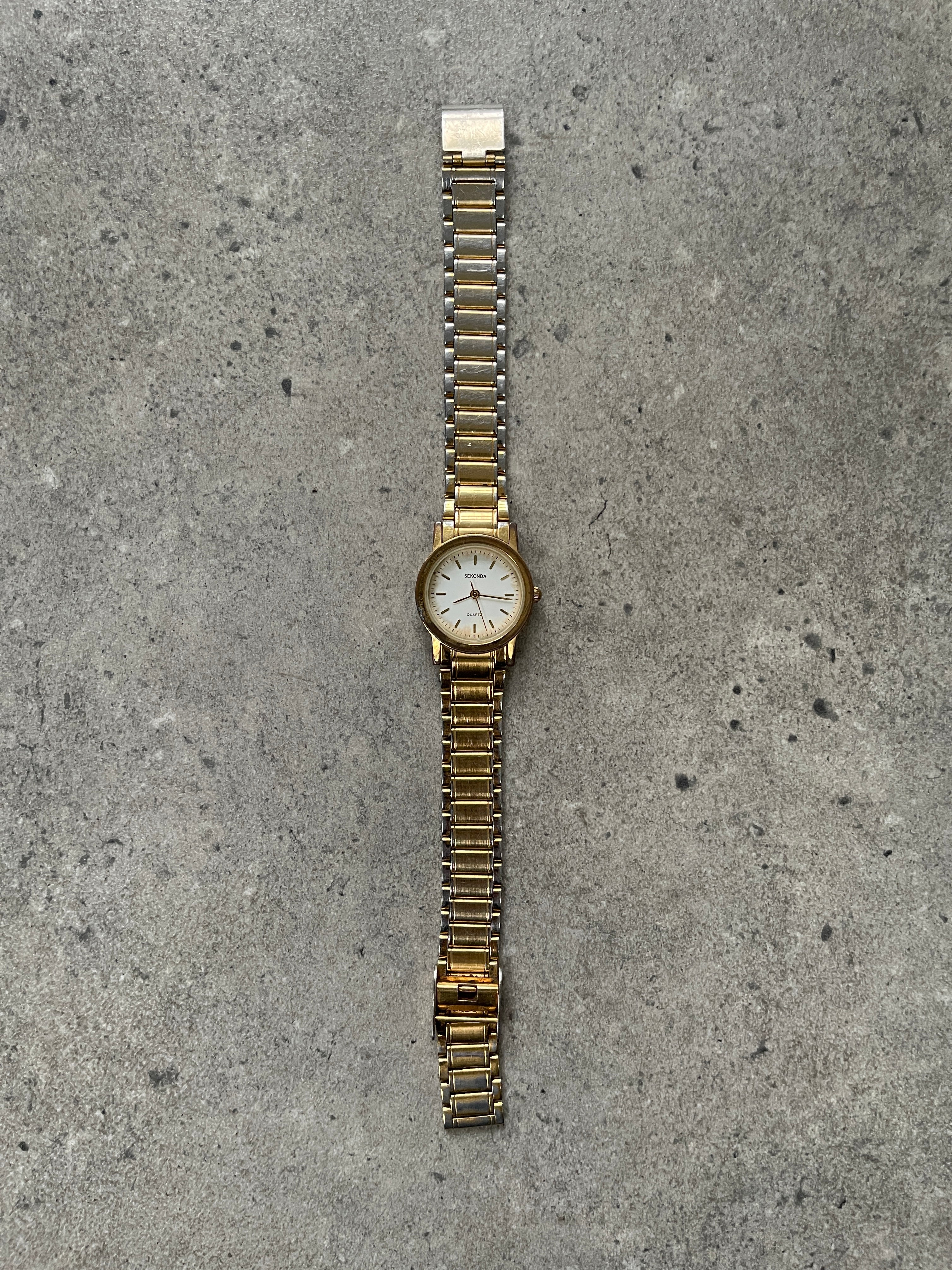 Sekonda 1990s gold-plated quartz bracelet watch with a round dial and classic design.