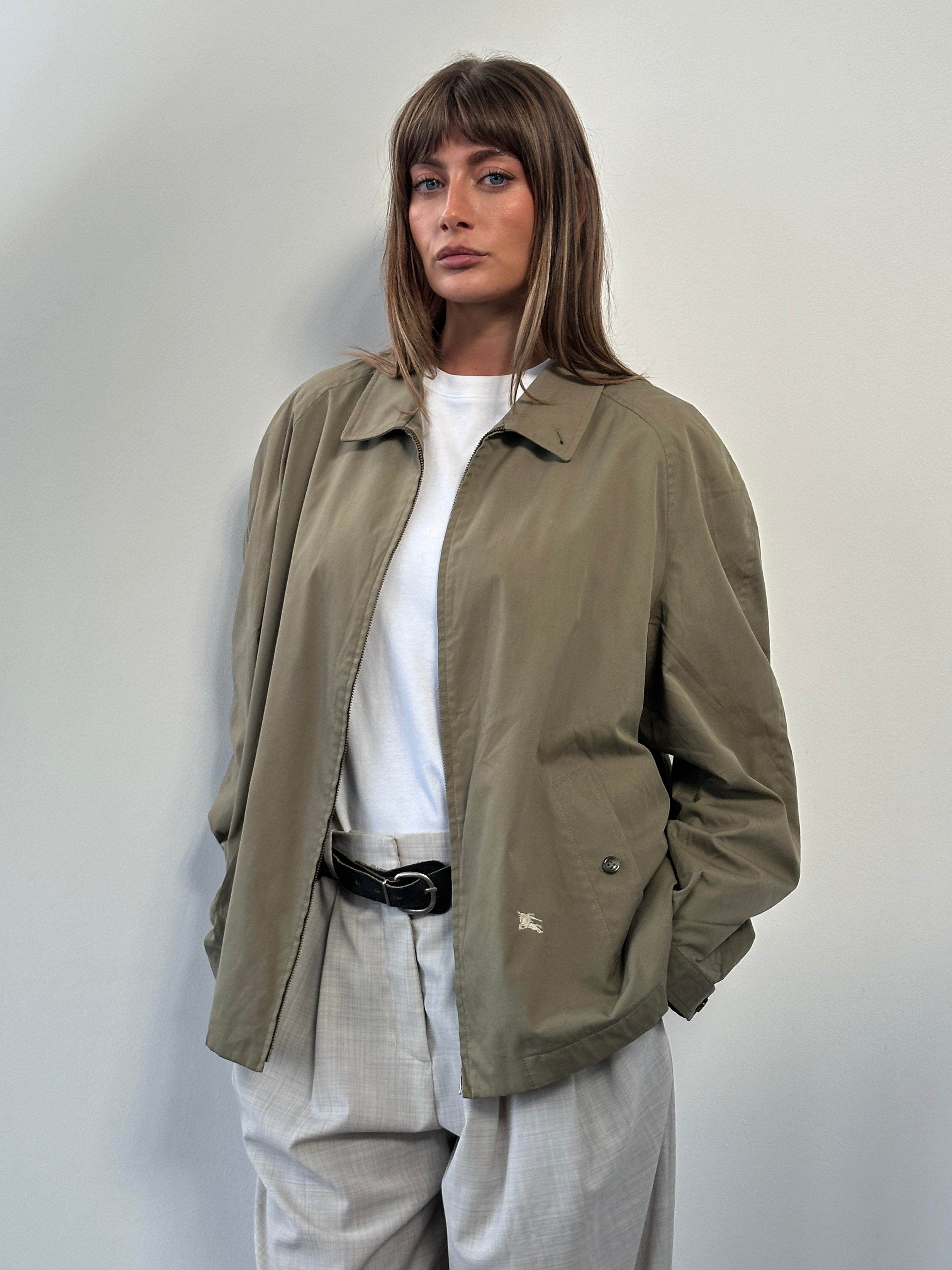 Burberry 1990s wool logo bomber jacket in XL, featuring classic design and the iconic Burberry check pattern on the sleeve.