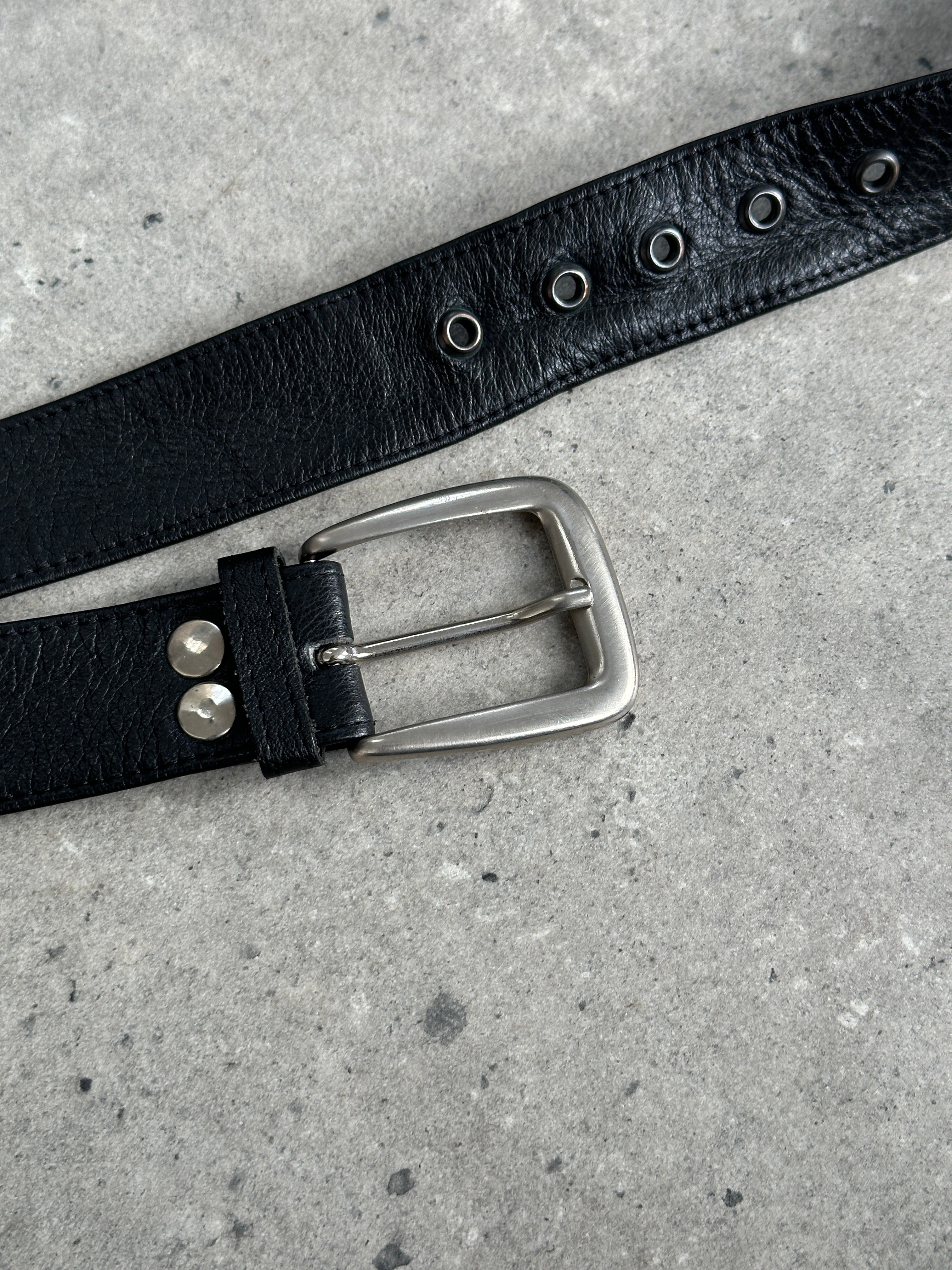 Vintage Italian chrome leather belt in W34-36 with classic design, featuring a sleek finish and durable craftsmanship.