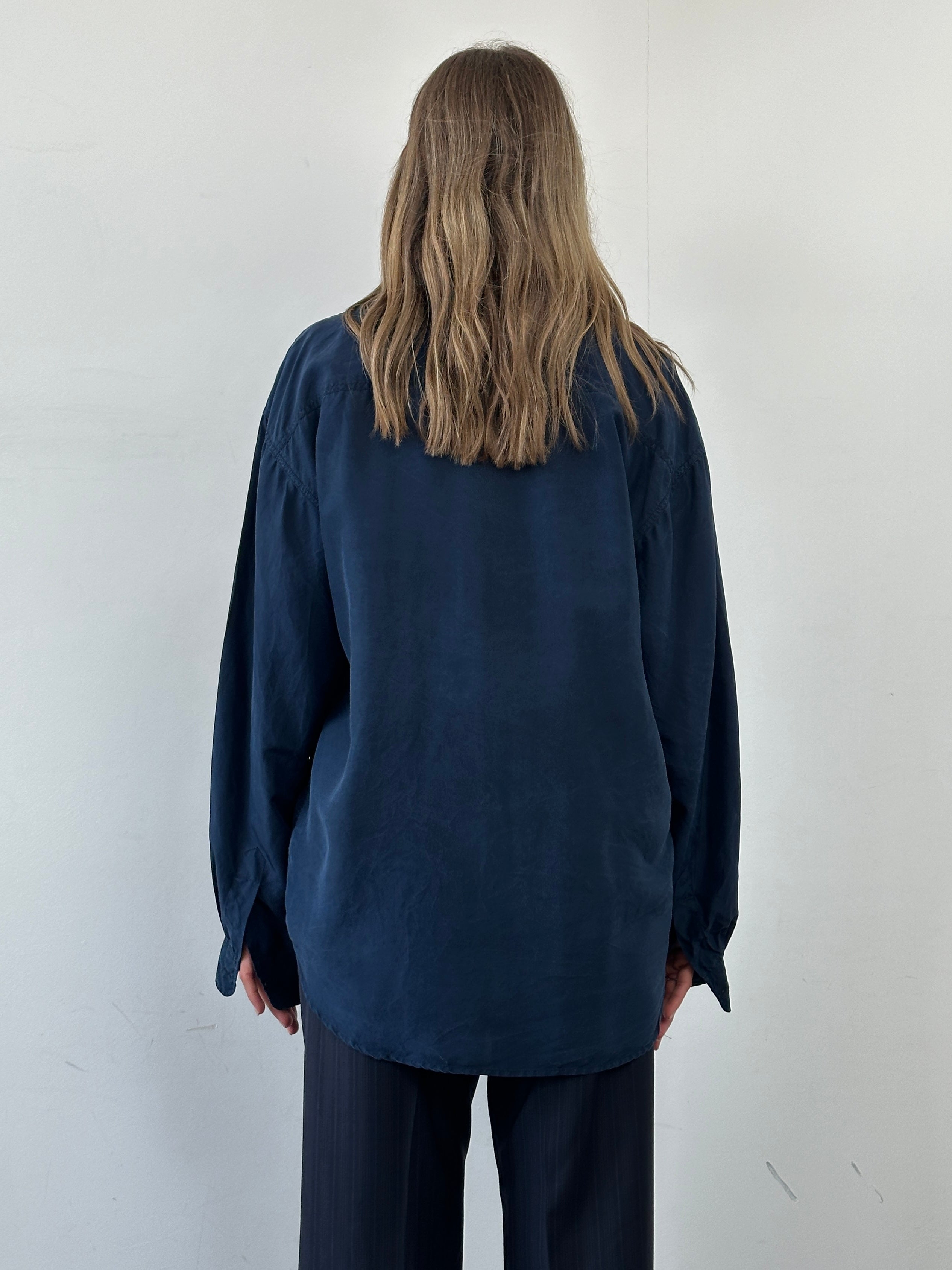United Colors of Benetton 90s relaxed pure silk shirt in XL, soft fabric, and casual fit shown on a hanger.
