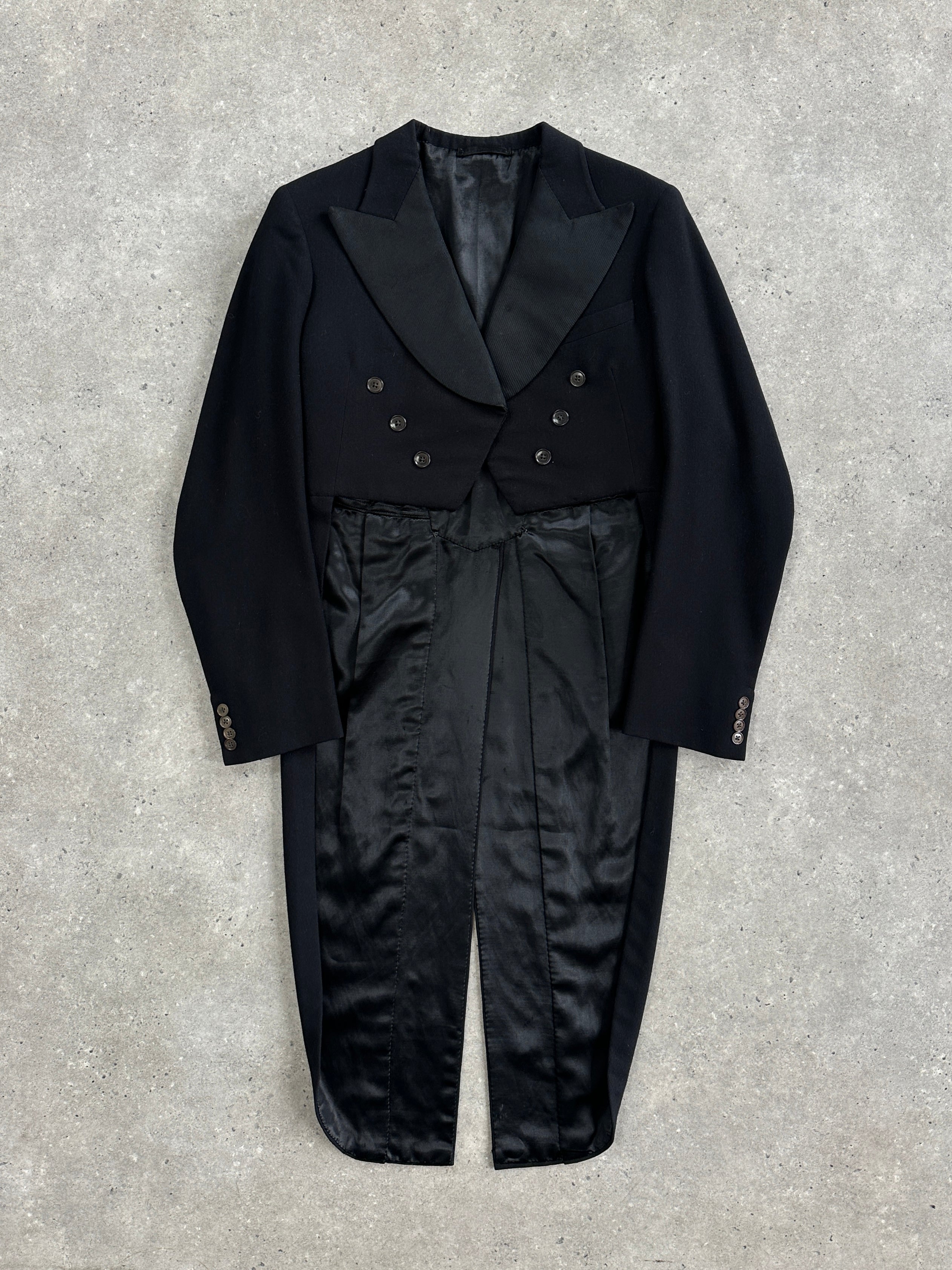 Vintage 1960s wool double-breasted tuxedo tailcoat blazer, size M, classic tailored design with peak lapels and front buttons.
