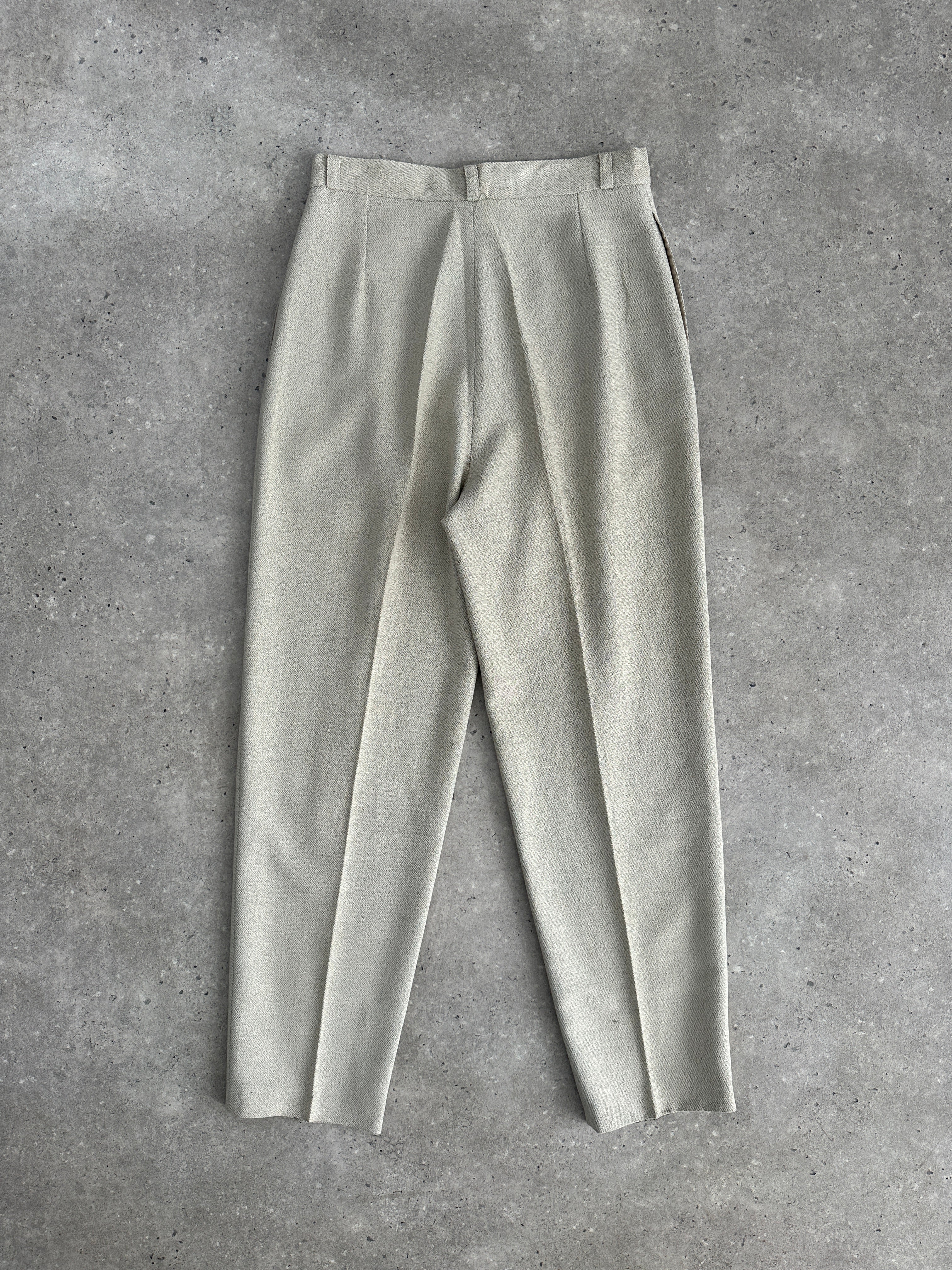 Vintage high waist tapered leg trousers with tailored fit, shown in a classic Italian vintage style, size W26.