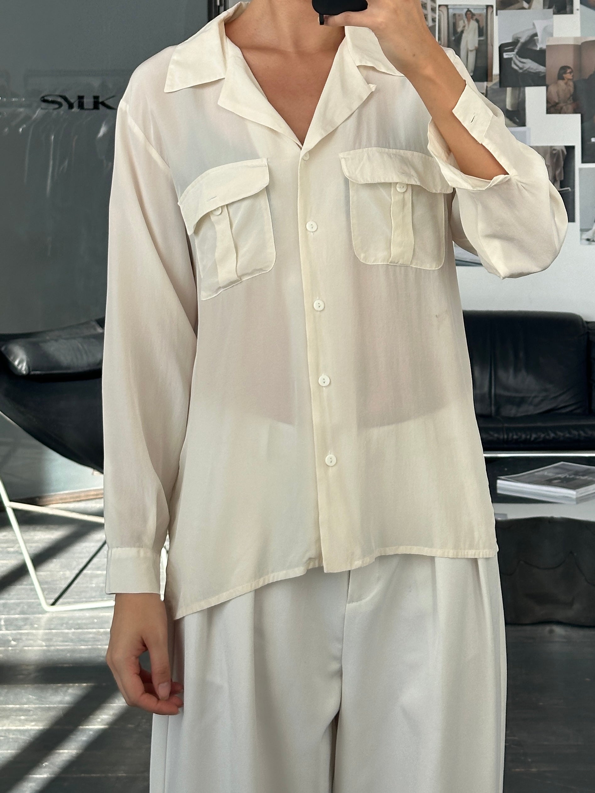 Vintage 1990s pure silk minimal shirt in size M, with a sleek design and smooth fabric, displayed on a neutral background.