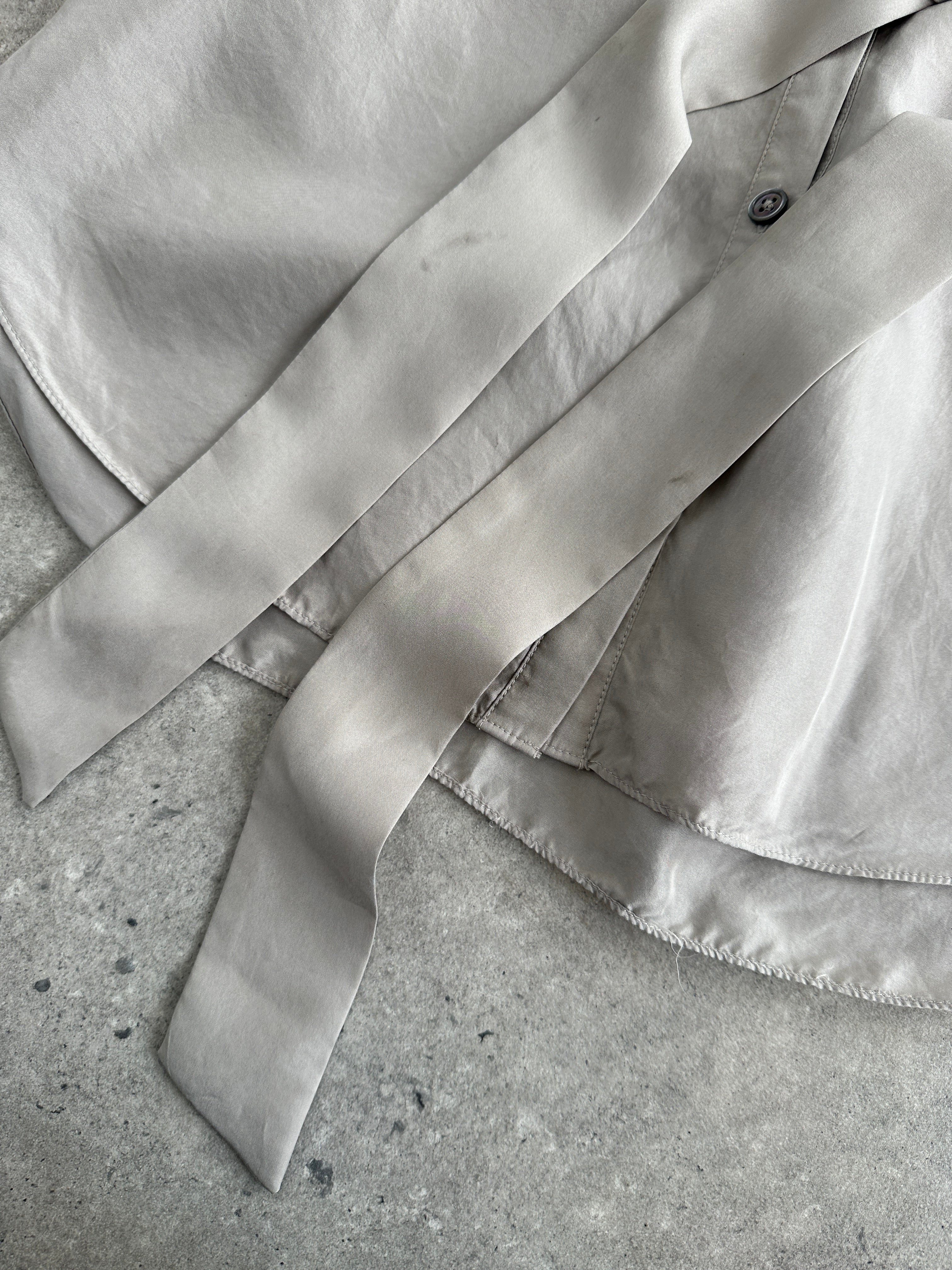 Jaeger pure silk belted shirt in size S, featuring a classic collar, long sleeves, and a tied waist, displayed on a neutral background.