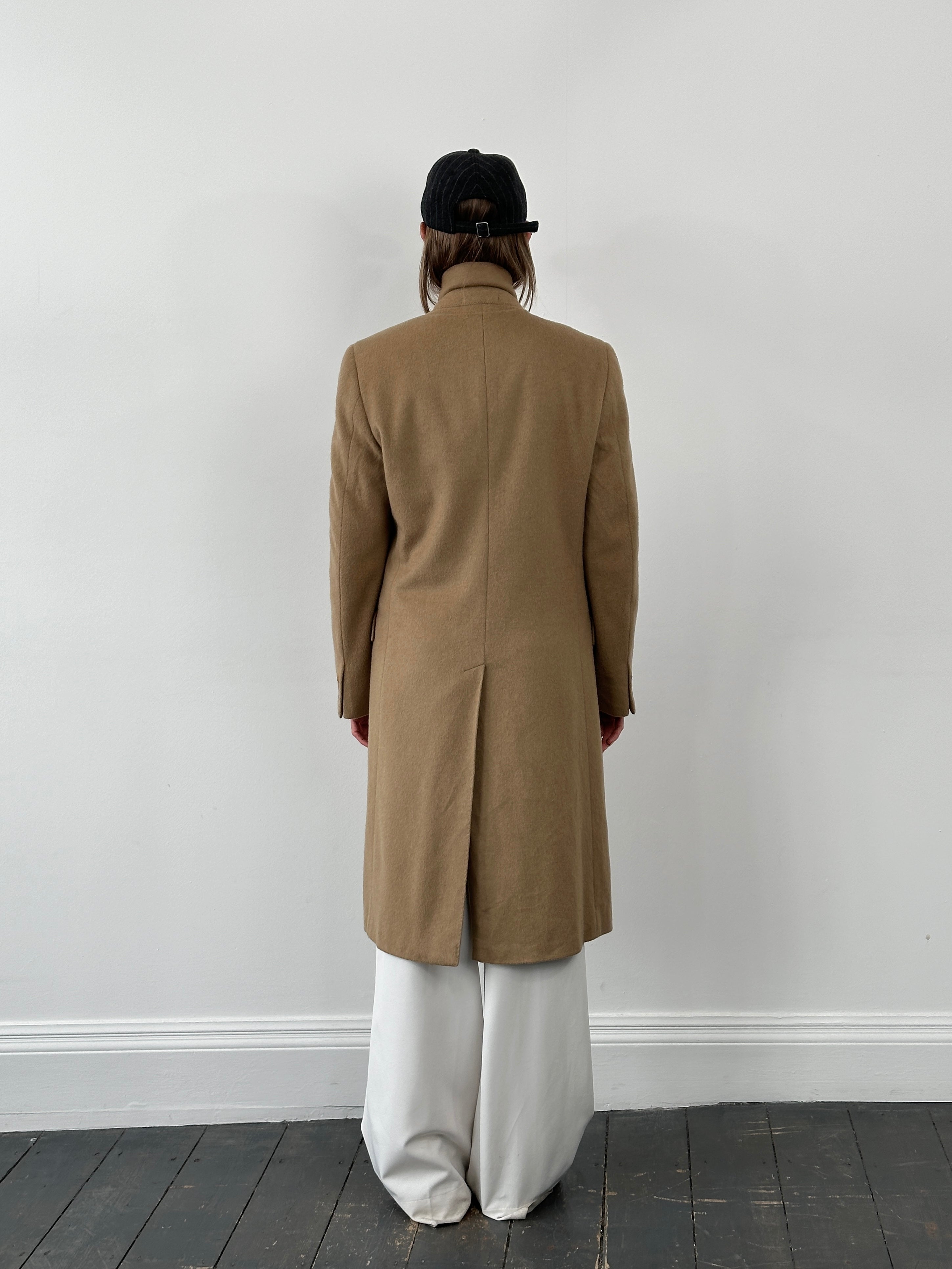 Vintage 1990s wool double-breasted high-neck coat, size large, with classic tailored design and textured fabric.