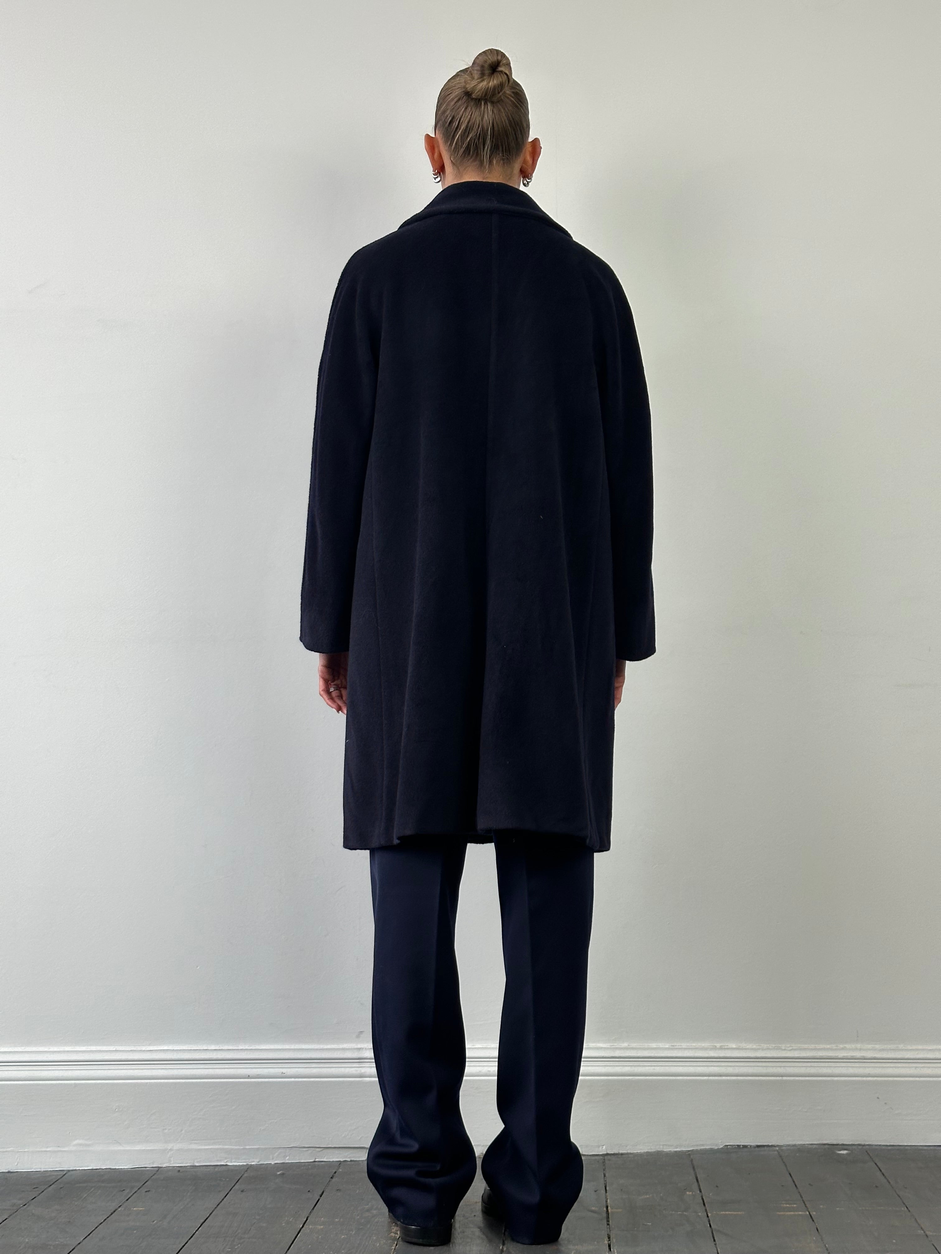 Max Mara wool and cashmere double-breasted A-line coat in size L, showcasing its classic design and tailored fit.