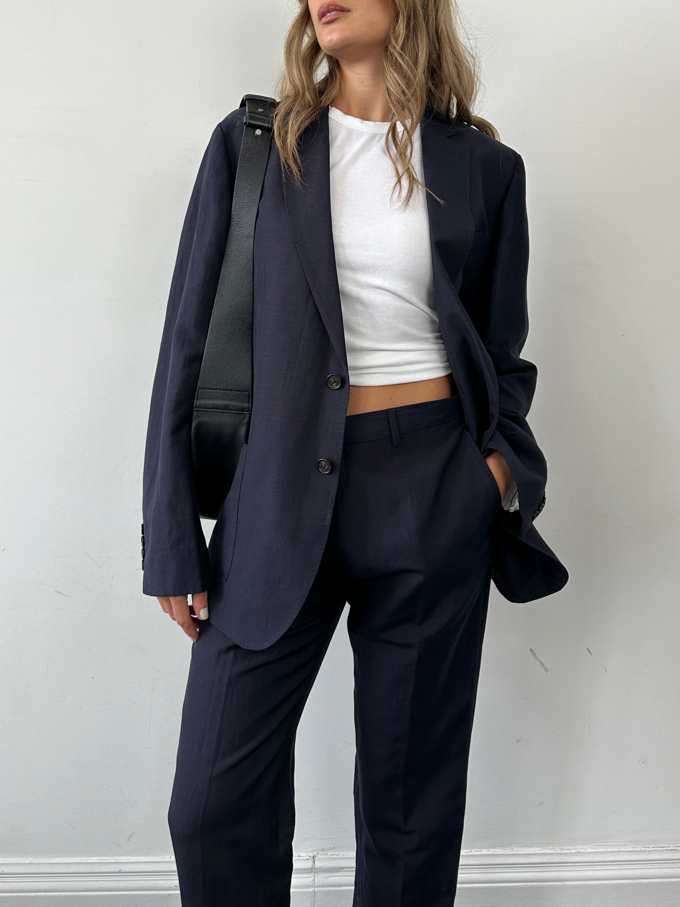 Jaeger Italian linen silk single-breasted jumpsuit in size 44R/W33, featuring a stylish tailored fit and elegant fabric details.