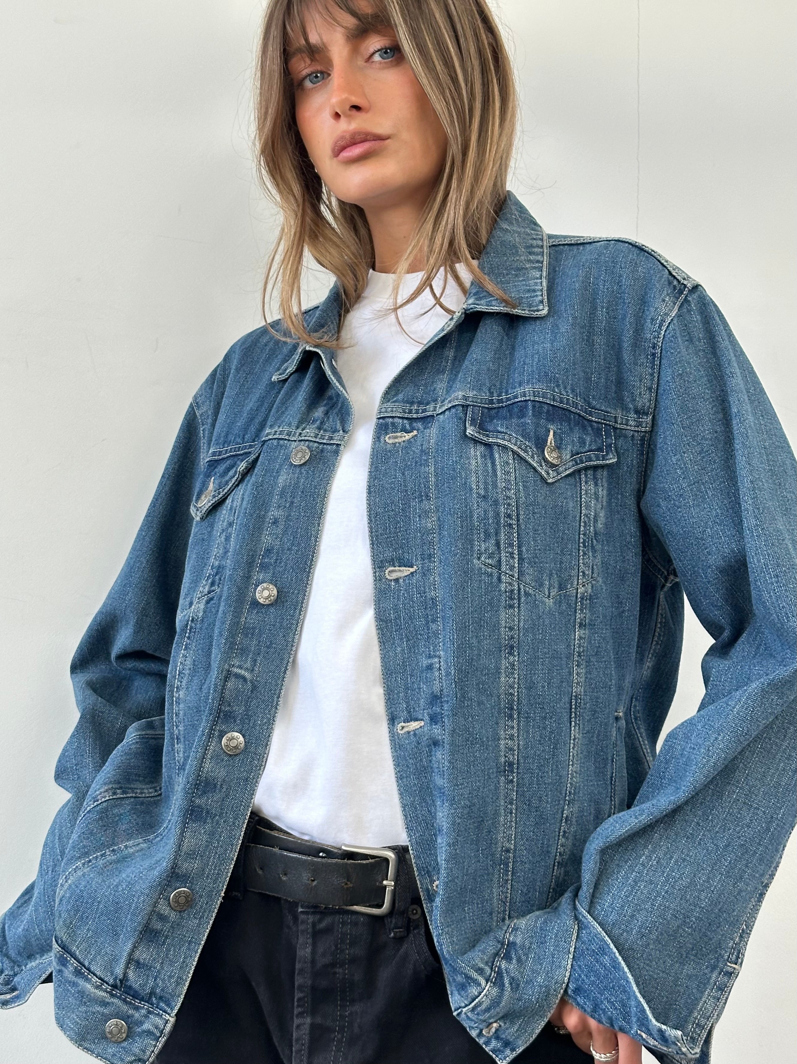 Vintage pure cotton denim jacket in XL size with classic design, featuring a button-front closure and chest pockets.