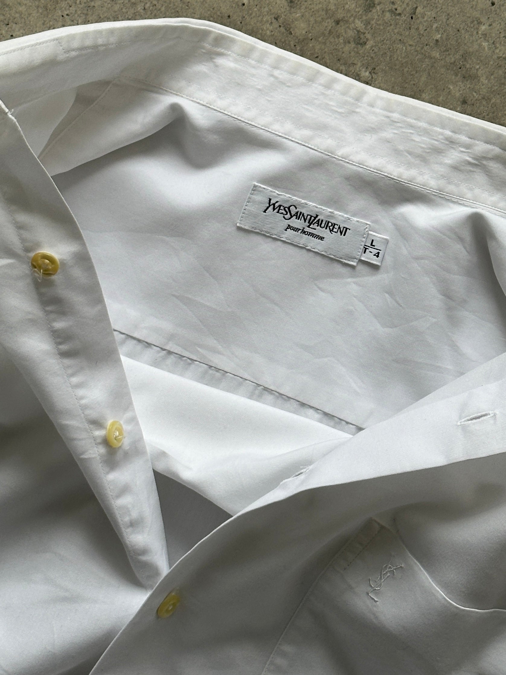 Yves Saint Laurent Pour Homme 1990s cotton logo shirt in size M/L, featuring classic design and embroidered YSL branding.