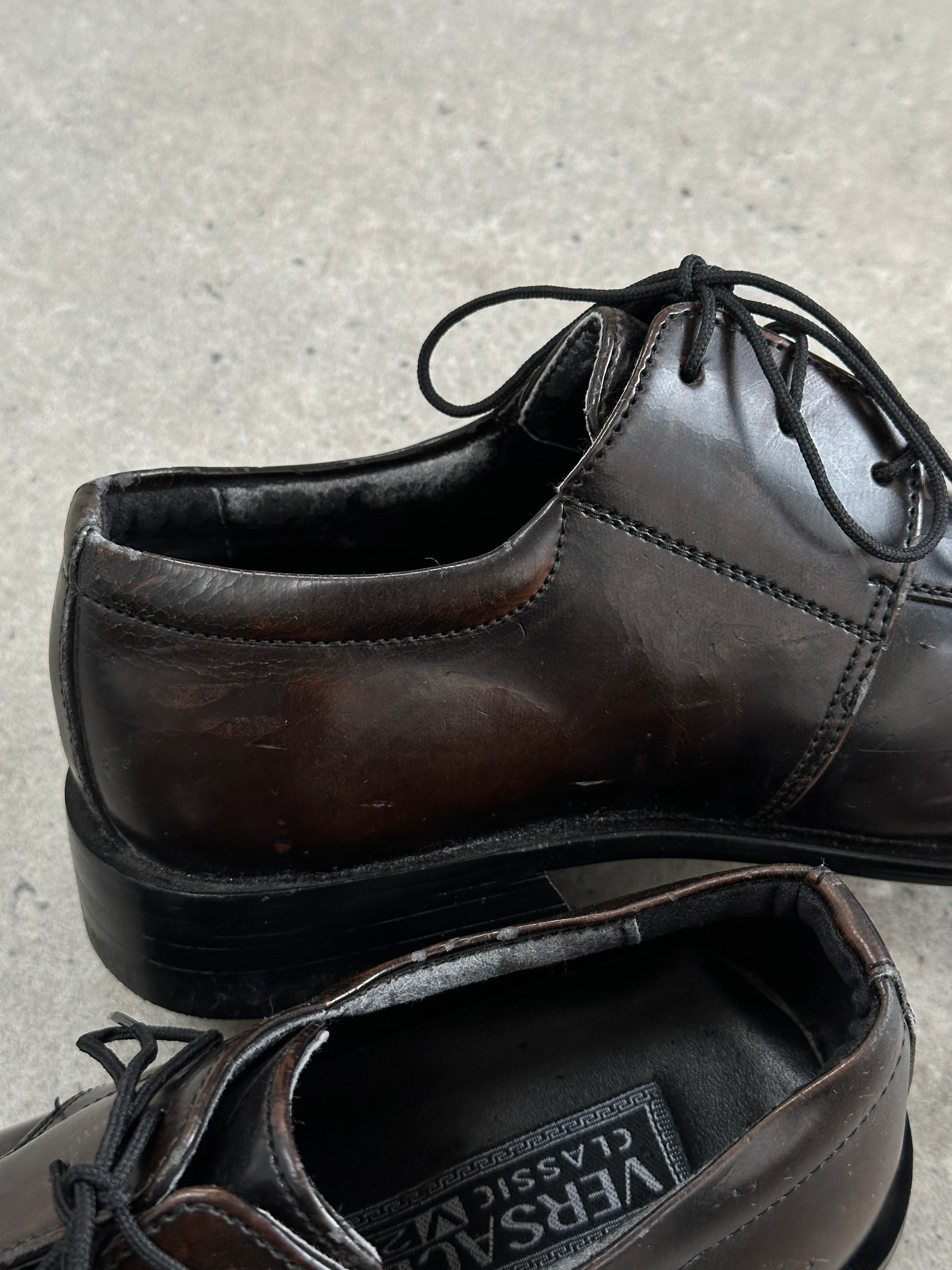 Versace Classic V2 leather square toe loafers in UK 7, showcasing sleek design and premium craftsmanship.