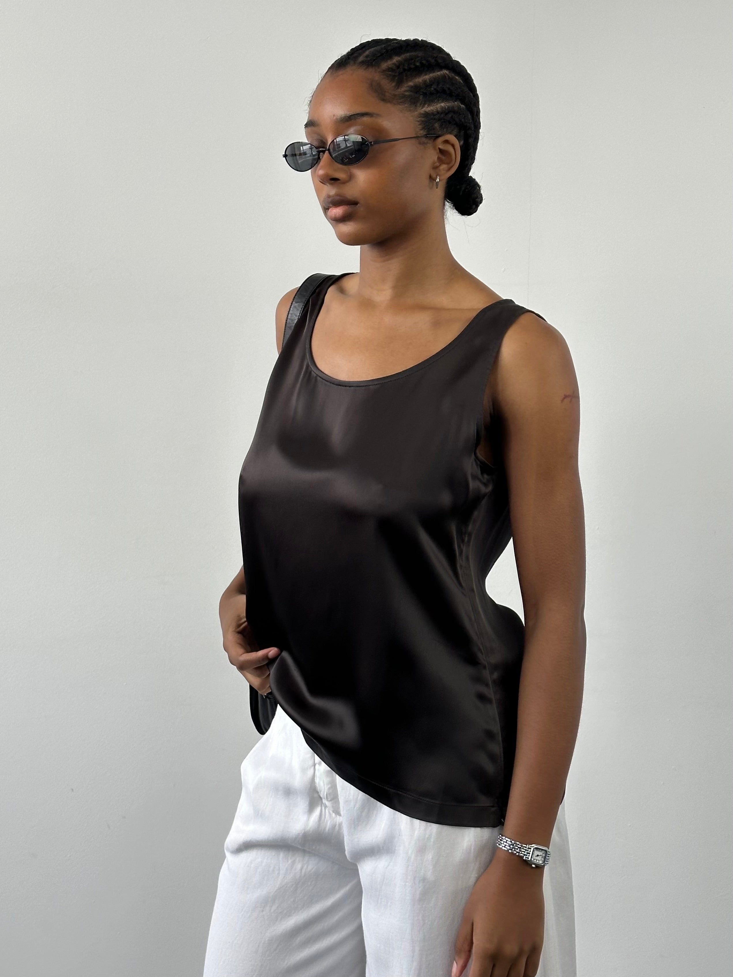 Gianfranco Ferré satin sleeveless top in size L, shown in a close-up image highlighting its smooth fabric and elegant design.