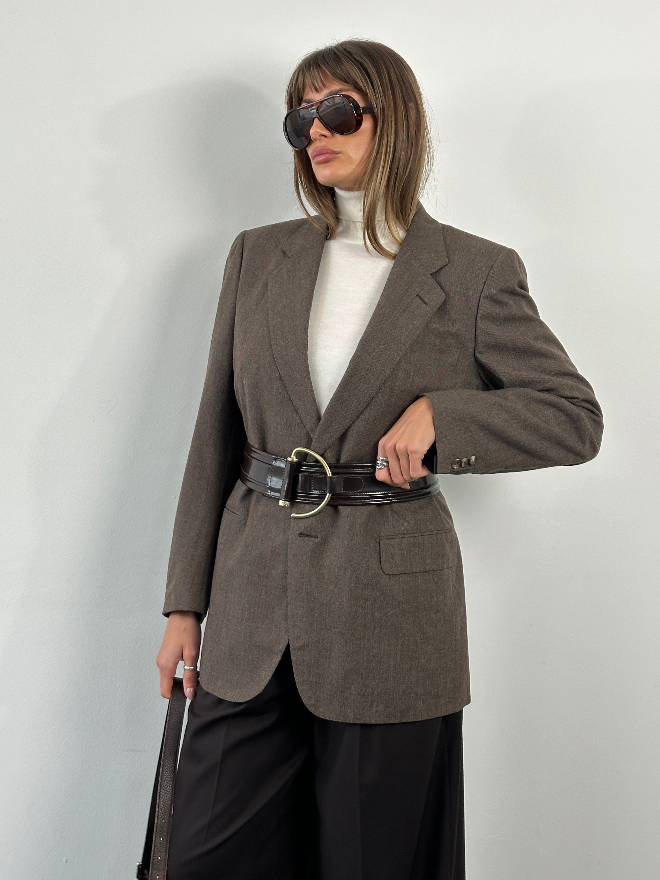 Burberry 1990s pure wool single-breasted blazer in size 42R/L, tailored fit with classic check lining and structured lapels.