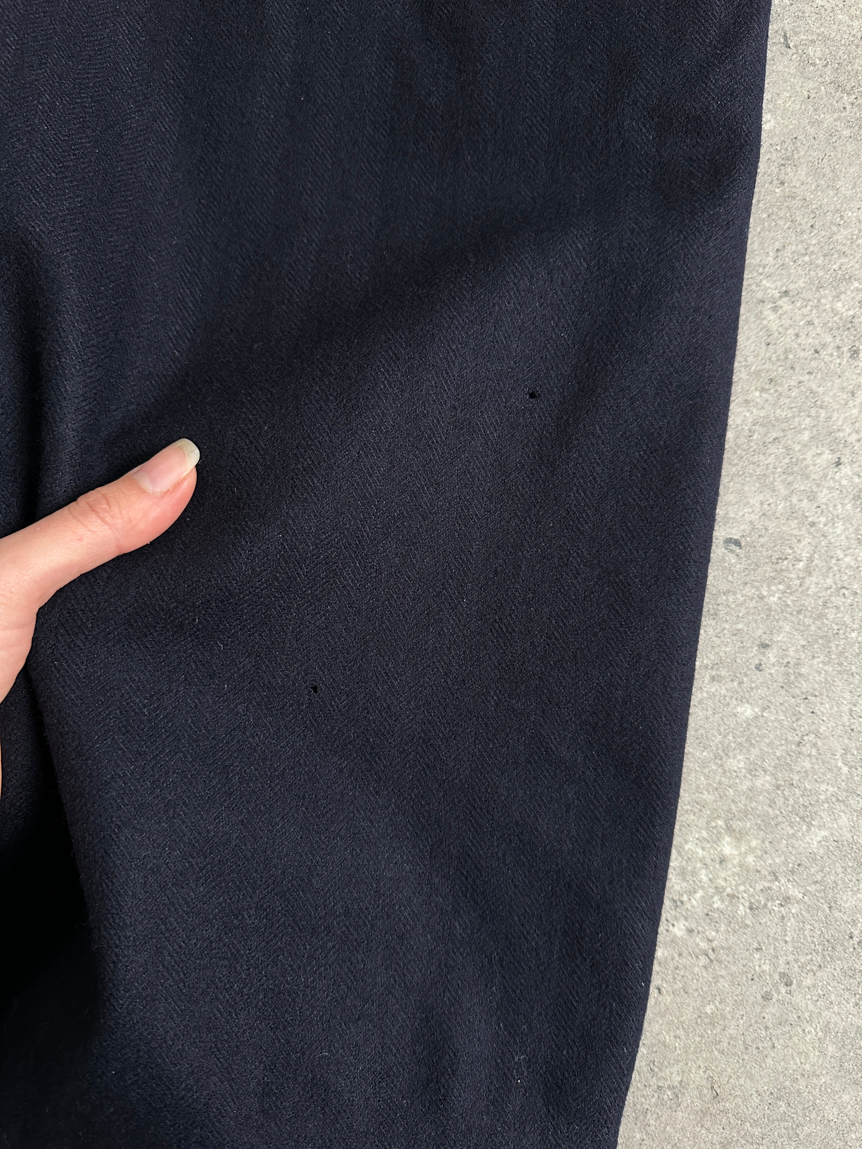 Christian Dior XL wool coat with concealed placket, tailored design, and classic style, shown on a hanger.