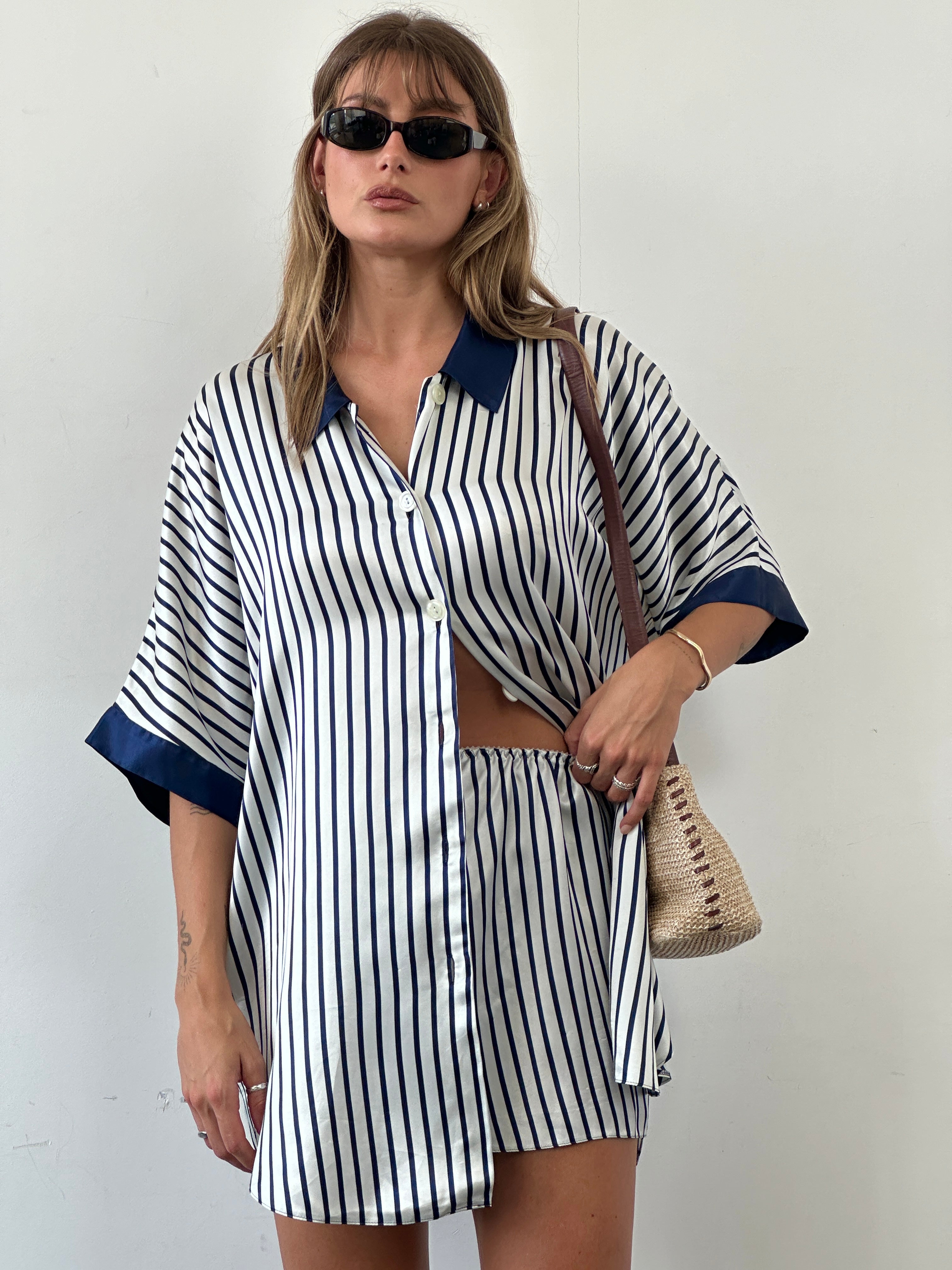 St Michael satin stripe two-piece shirt and shorts set in M/L, featuring a stylish shirt and matching shorts with a satin finish.