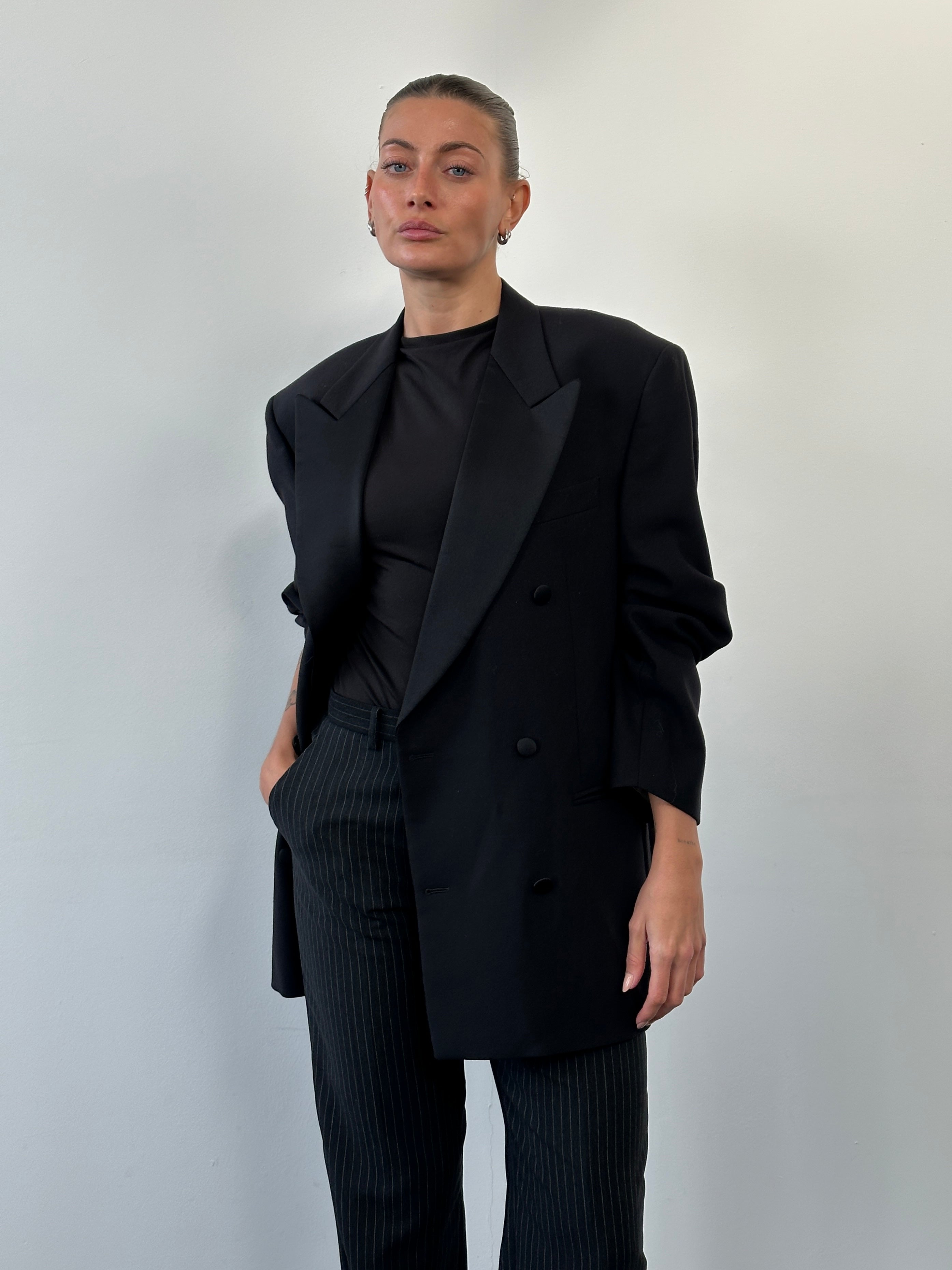 Gianfranco Ferre 1990s pure wool double-breasted tuxedo blazer, size 42R/XL, in classic black with structured lapels and button details.