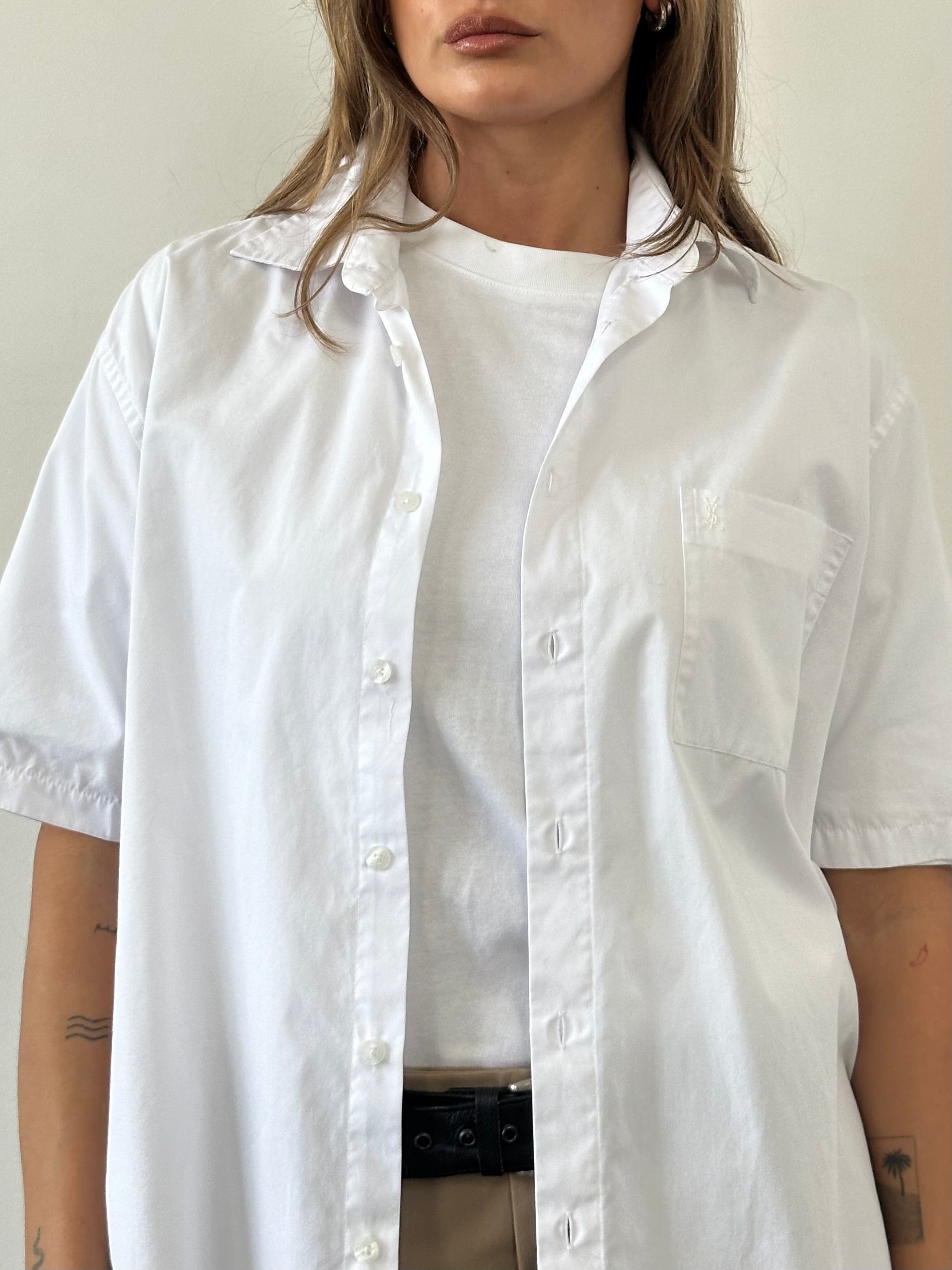 Yves Saint Laurent Pour Homme cotton short sleeve logo shirt in size L with classic fit and brand logo on chest.