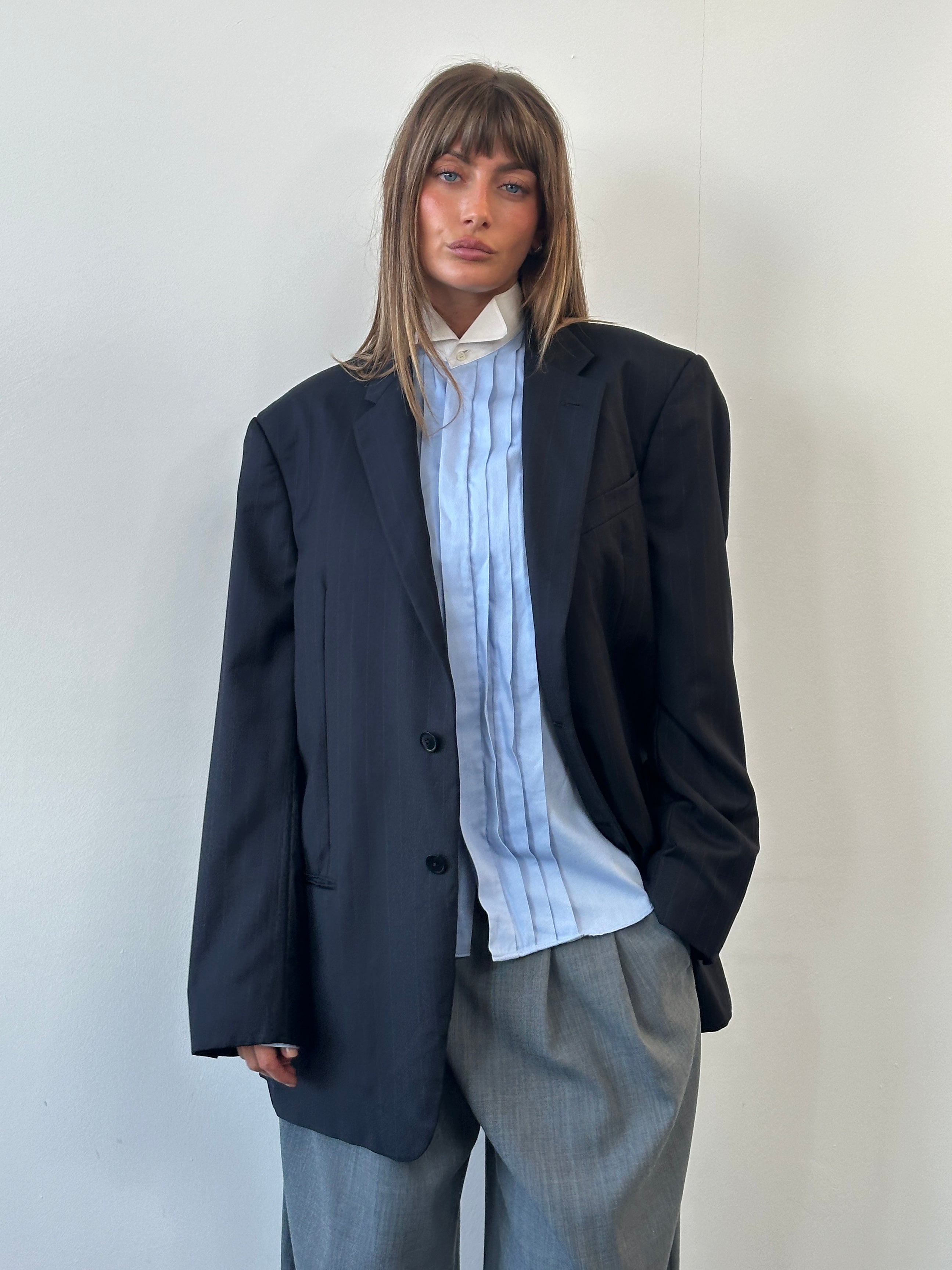 Armani Collezioni men's 2000s pure wool striped single-breasted blazer in size 44L/XXL, shown on a hanger with front view.