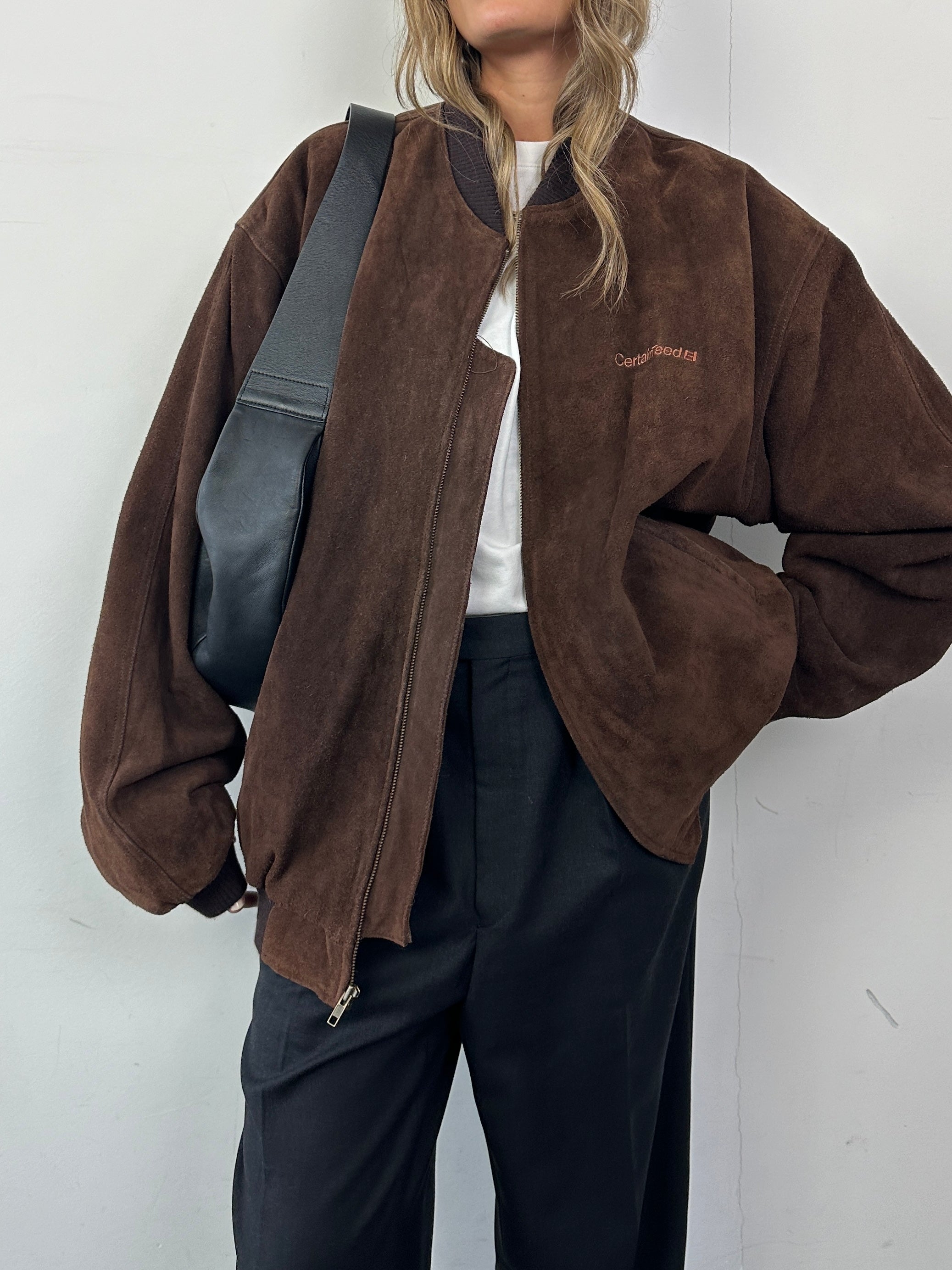 Vintage suede leather bomber jacket with embroidery, XXL size, featuring classic design and textured suede material.