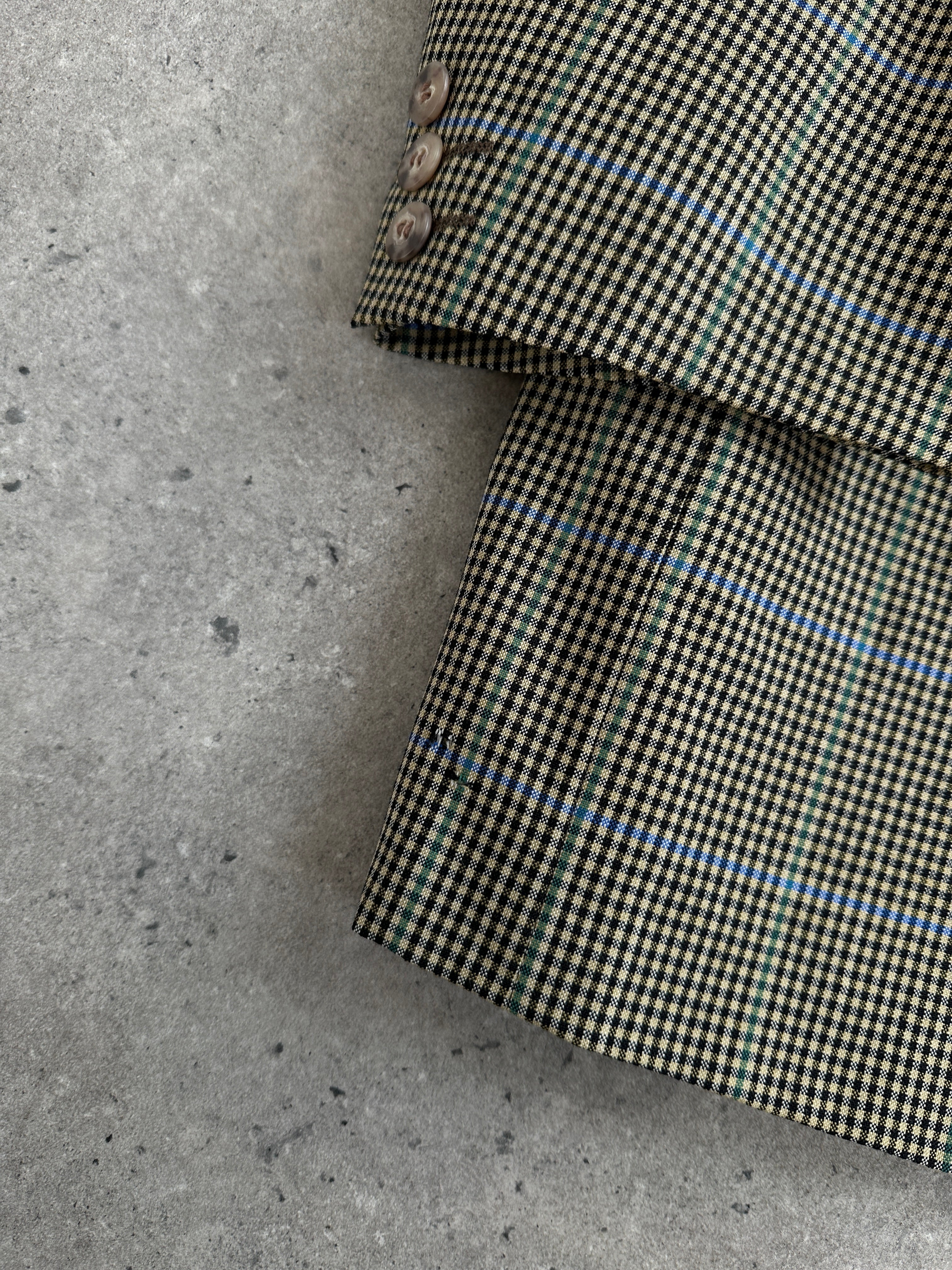 Yves Saint Laurent men's 1990s wool check blazer, single-breasted, size 44R/XL, with classic tailored fit and stylish pattern.