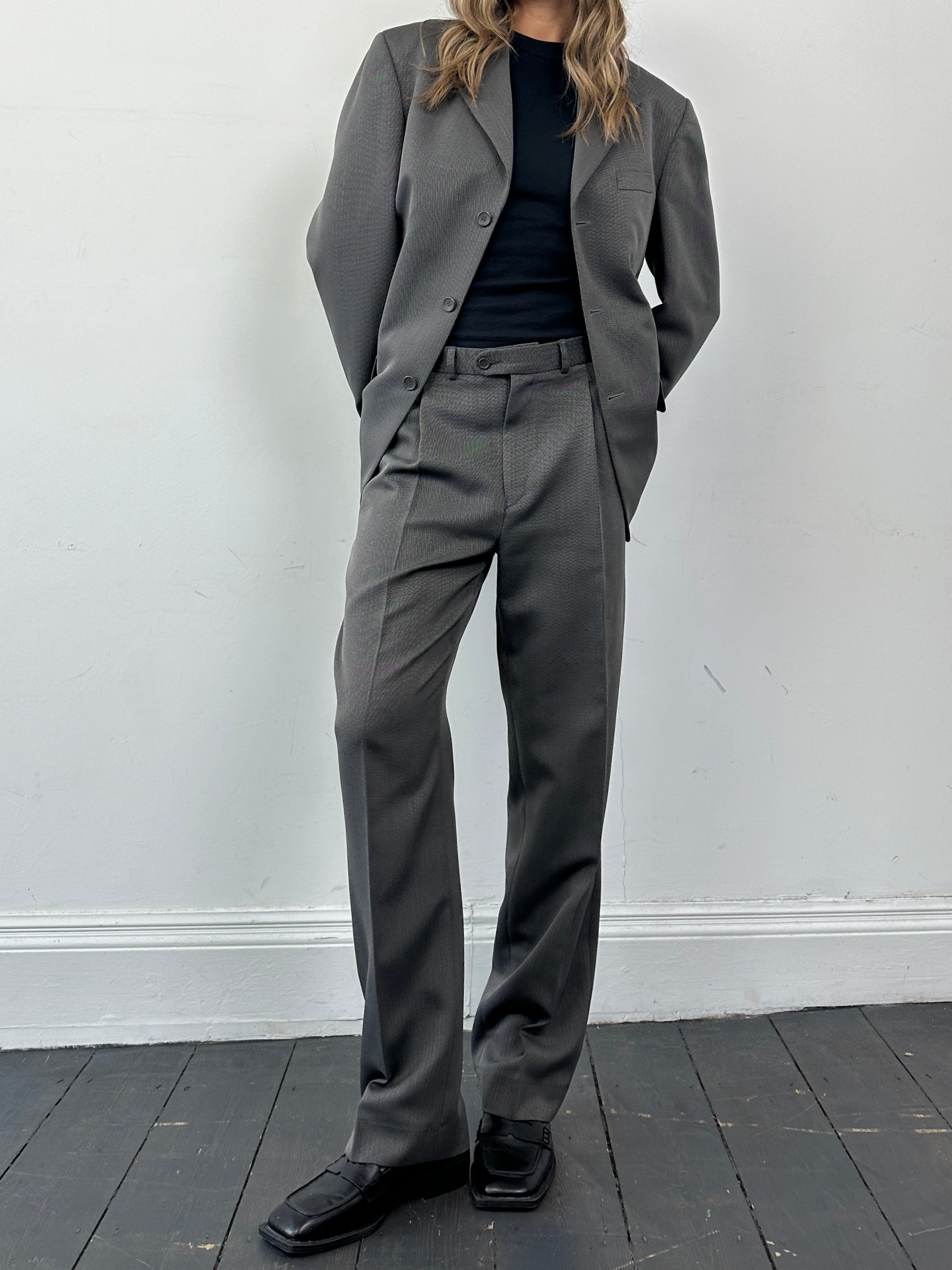Vintage herringbone single-breasted suit jumpsuit, size 38R/W32, featuring classic tailored design and vintage fabric details.