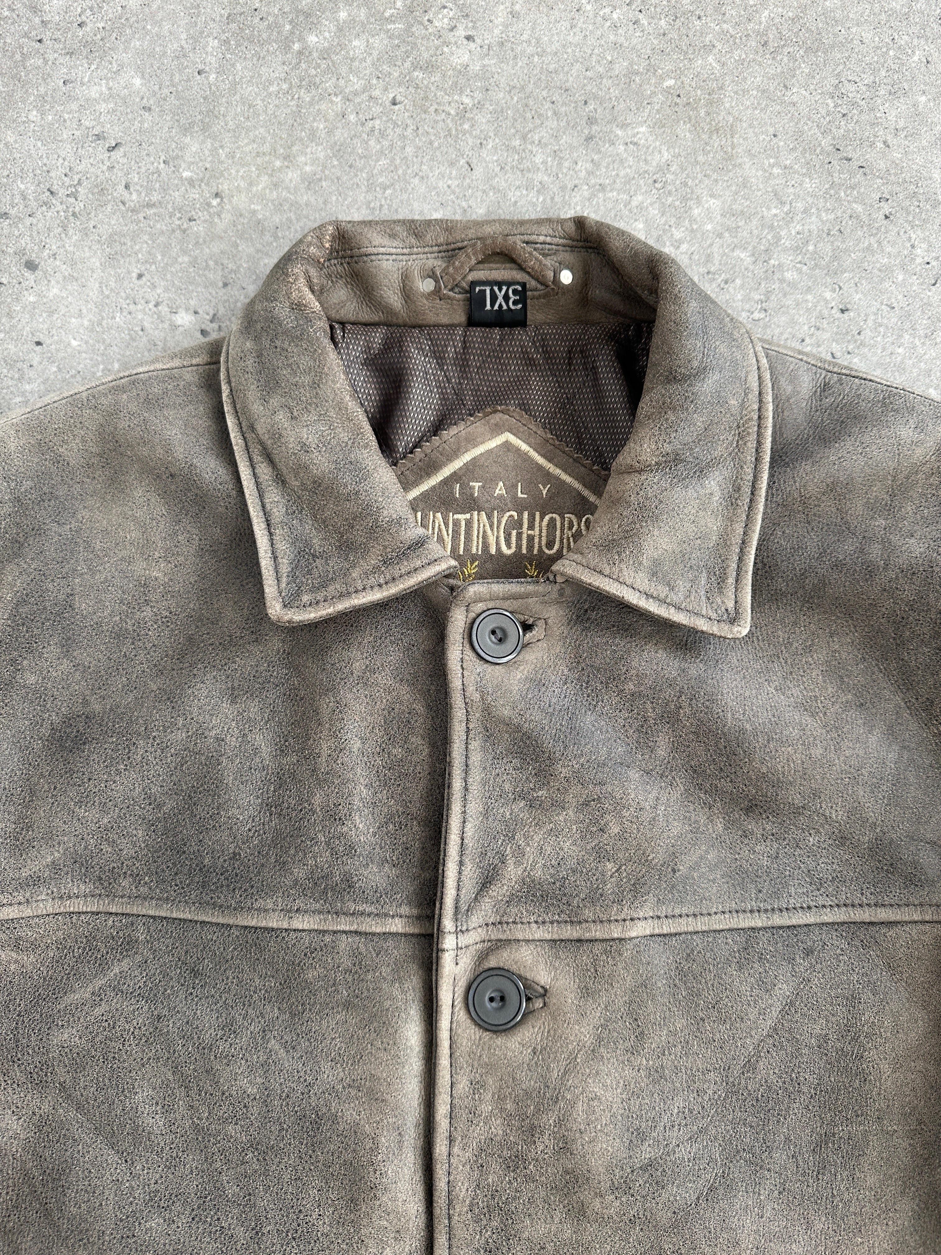 Vintage Italian 1990s aged leather jacket, XL size, showcasing distressed brown leather and classic collar detail.