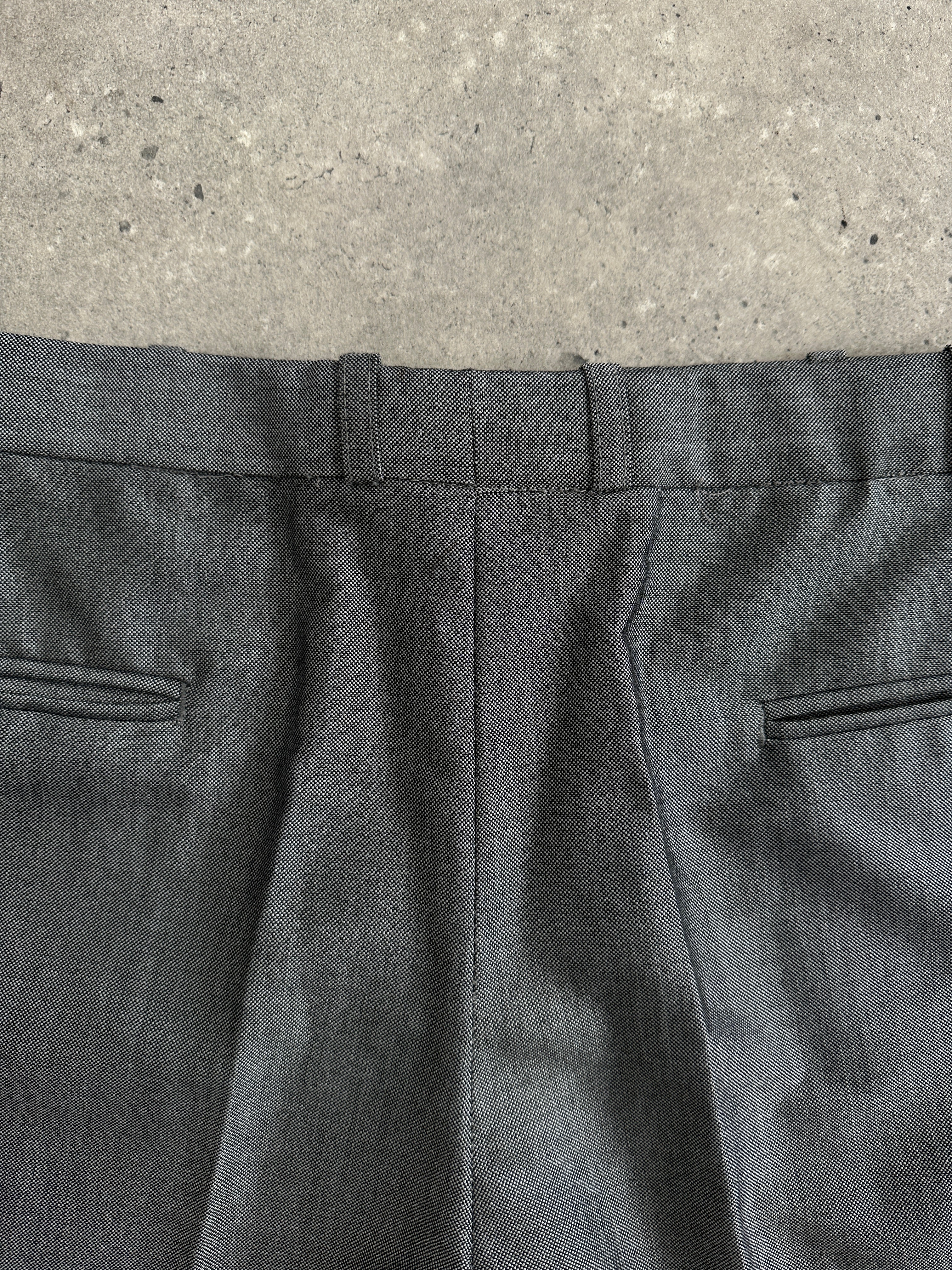 Christian Dior Monsieur wool single-breasted jumpsuit in size 44L/W36, tailored fit with classic lapels and sleek fabric.