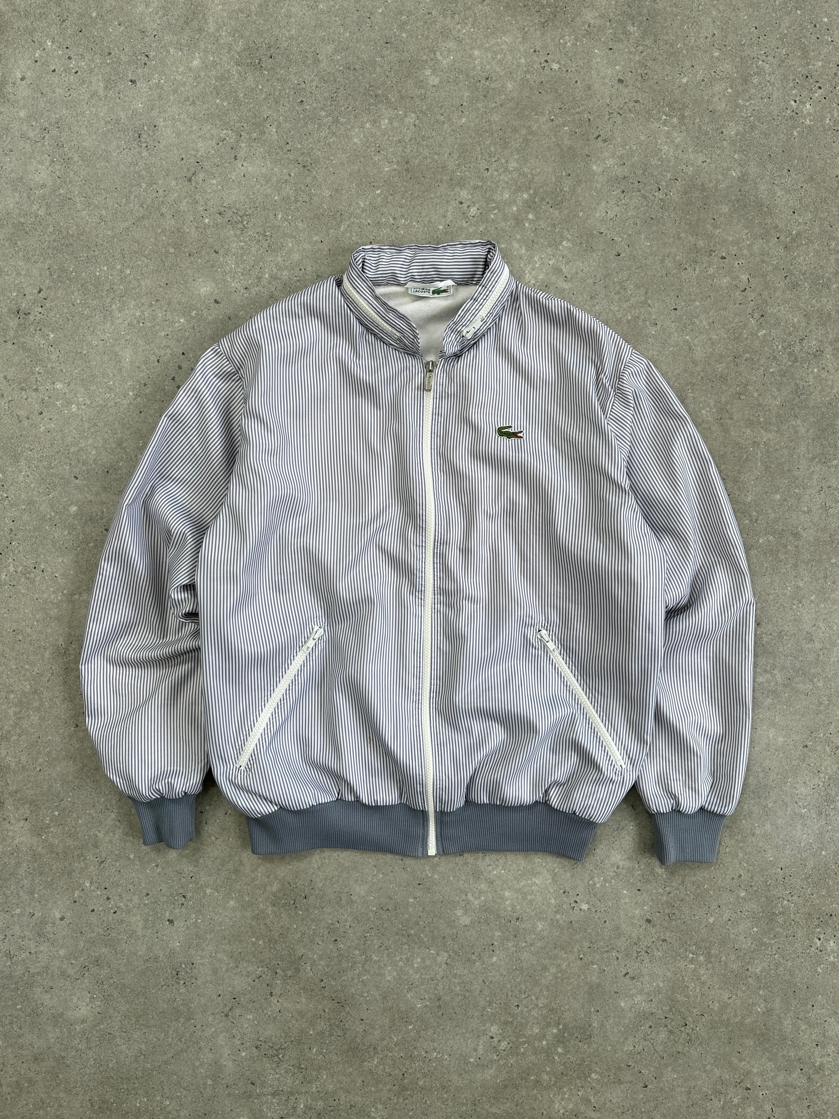 Lacoste 80s stripe tracksuit jacket in size L, featuring classic design with bold striped pattern and Lacoste logo details.